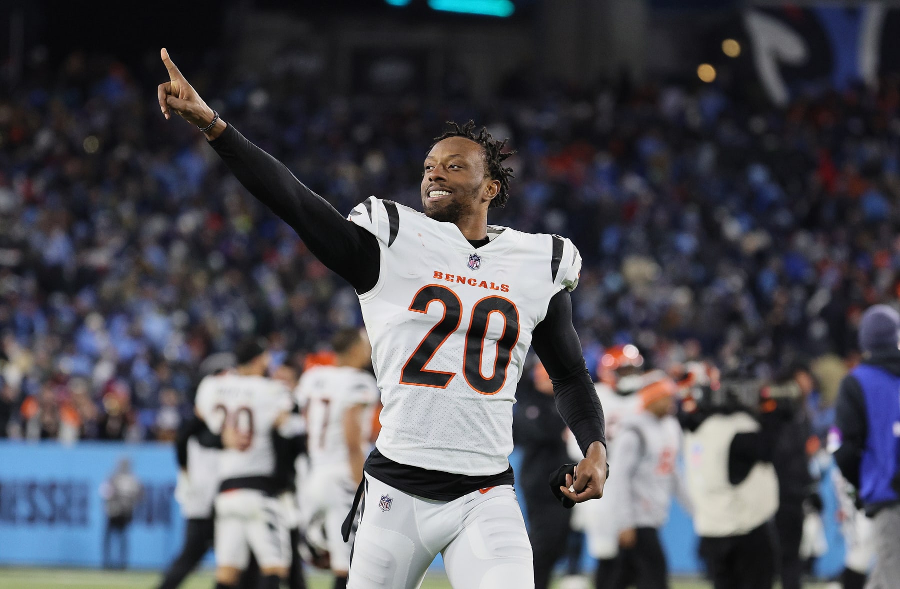 NASHVILLE, TENNESSEE - JANUARY 22: Eli Apple #20 of the Cincinnati Bengals celebrates after the win against the Tennessee Titans during the AFC Divisional Playoff at Nissan Stadium on January 22, 2022 in Nashville, Tennessee. (Photo by Andy Lyons/Getty Images)