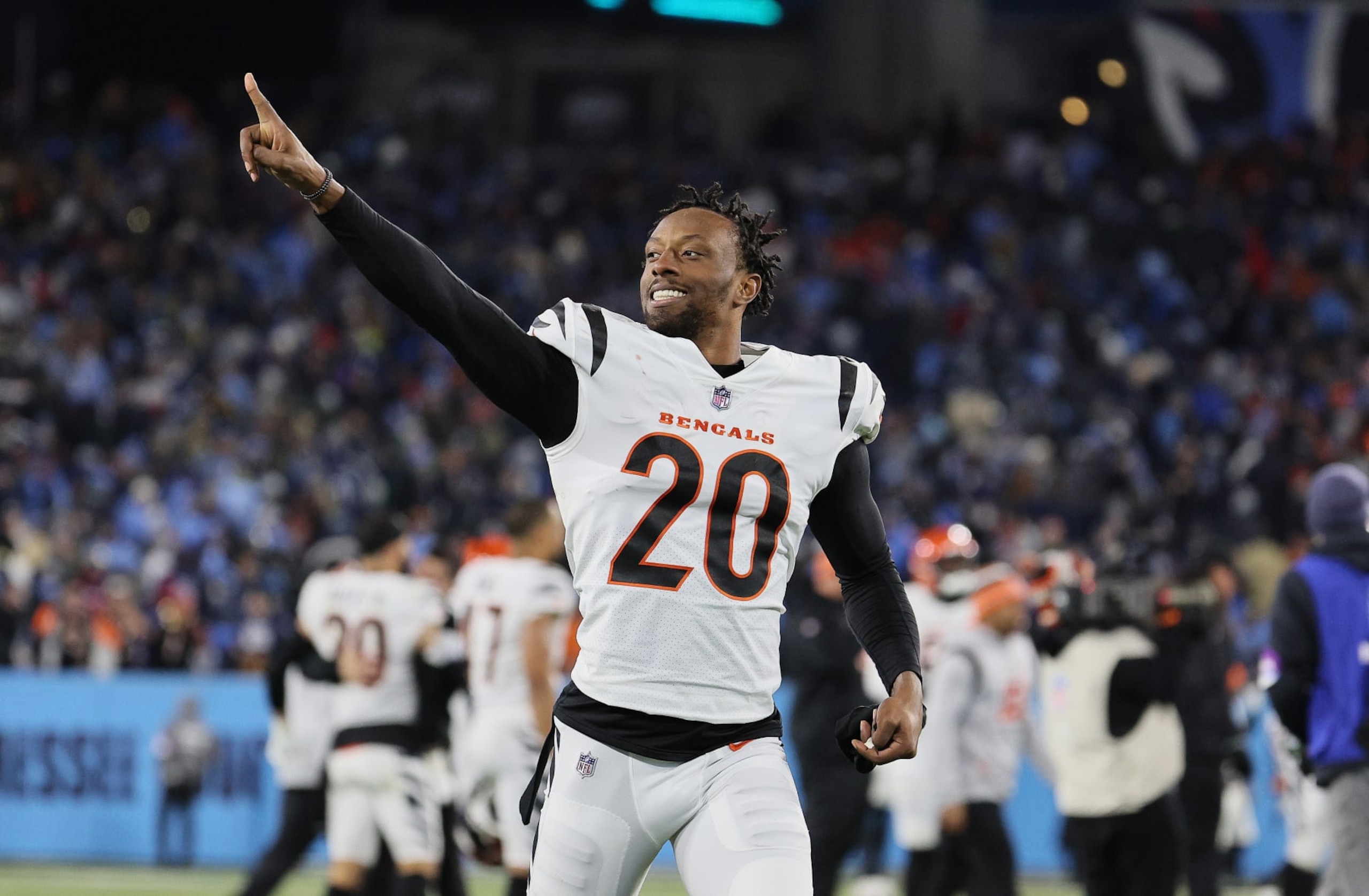 NASHVILLE, TENNESSEE - JANUARY 22: Eli Apple #20 of the Cincinnati Bengals celebrates after the win against the Tennessee Titans during the AFC Divisional Playoff at Nissan Stadium on January 22, 2022 in Nashville, Tennessee. (Photo by Andy Lyons/Getty Images)