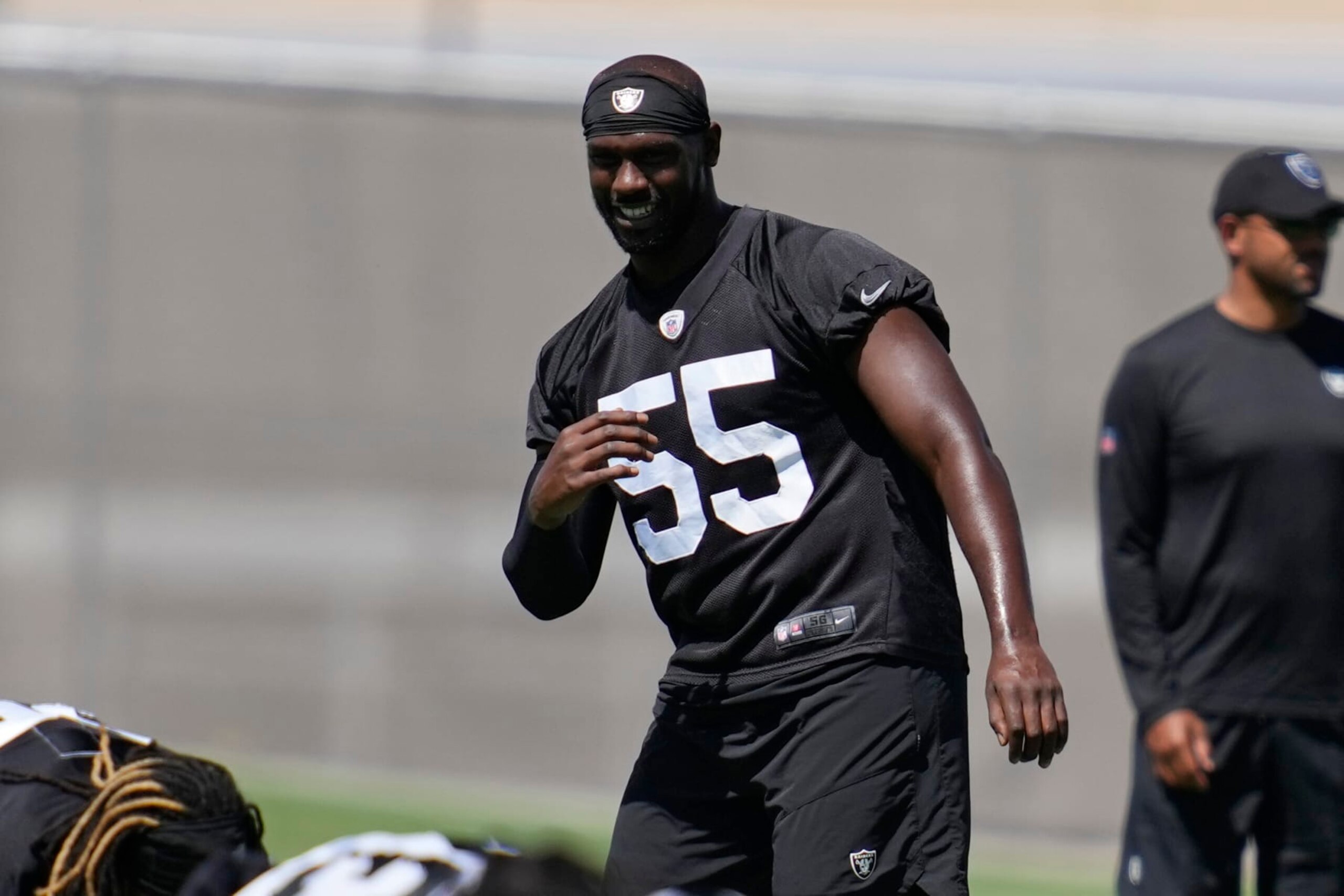 Las Vegas Raiders defensive end Chandler Jones warms up at the NFL football team's practice facility Tuesday, June 7, 2022, in Henderson, Nev. (AP Photo/John Locher)