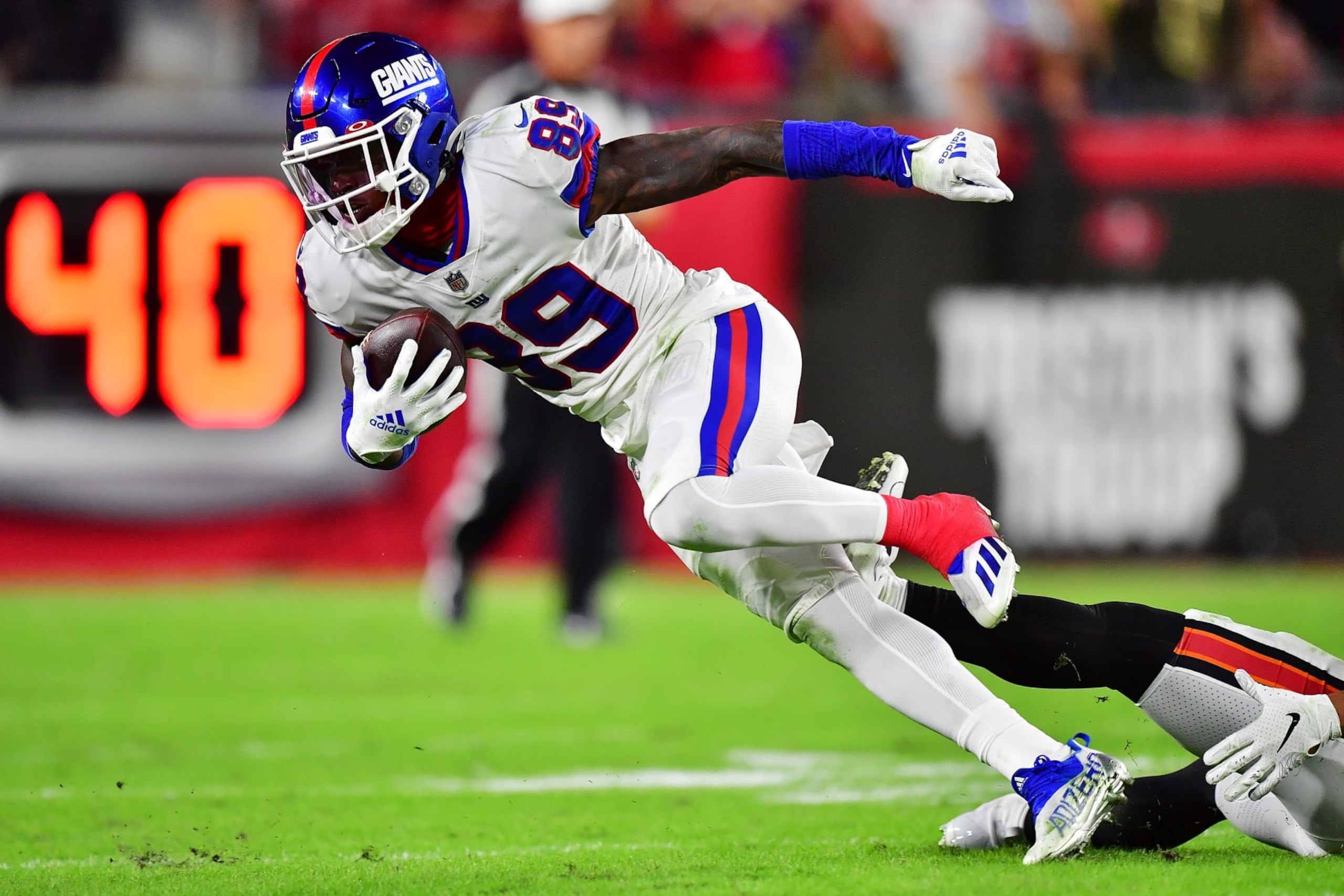 TAMPA, FLORIDA - NOVEMBER 22: Kadarius Toney #89 of the New York Giants carries the ball after a reception against the Tampa Bay Buccaneers during the third quarter at Raymond James Stadium on November 22, 2021 in Tampa, Florida. (Photo by Julio Aguilar/Getty Images)