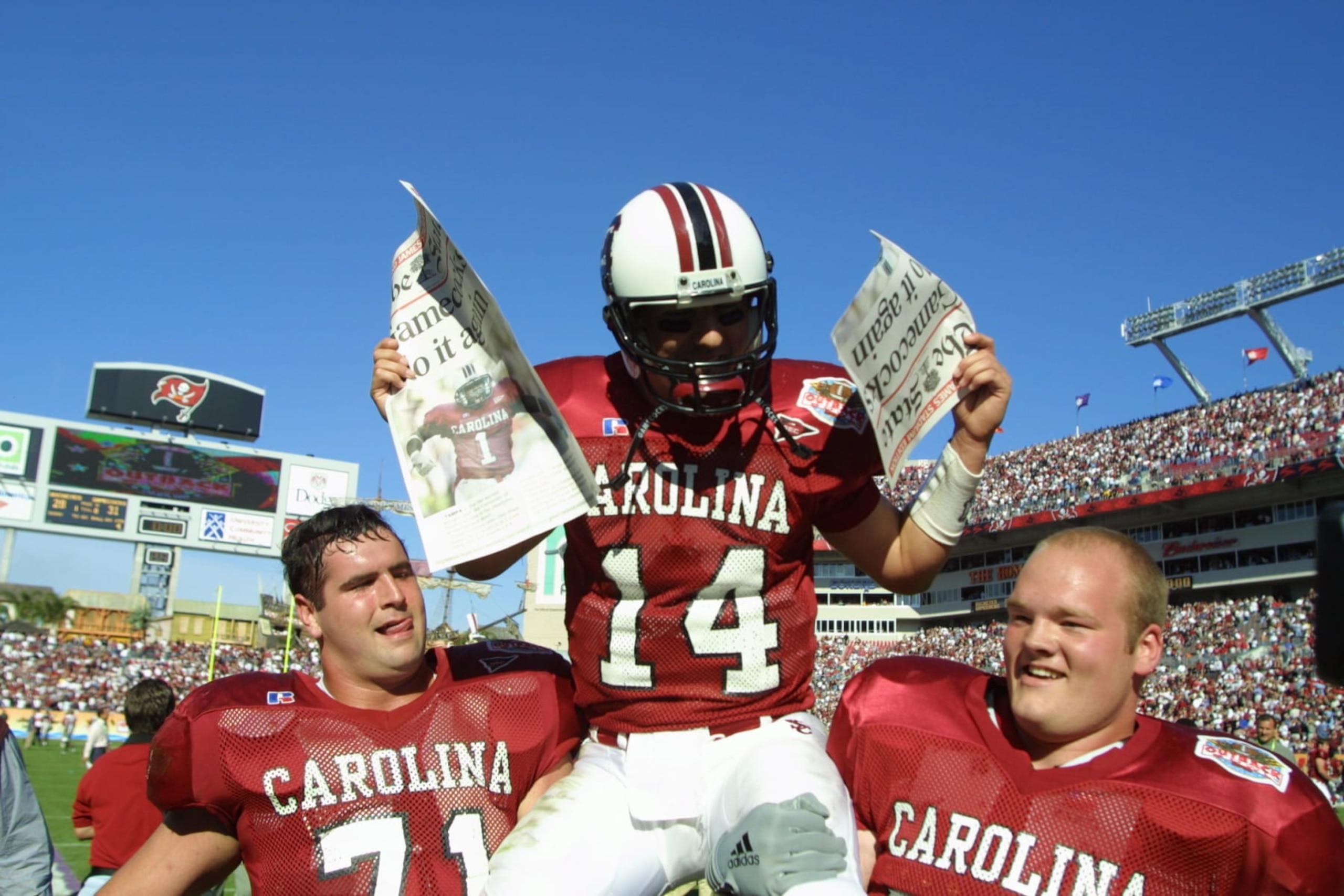 1 Jan 2002: South Carolina quarterback Phil Petty, #14, is carried off the field by teammates after beating Ohio State 31-28 in the Outback Bowl at Raymond James Stadium in Tampa, Florida. DIGITAL IMAGE. Mandatory Credit: Scott Halleran/Getty Images 1 Jan 2002: South Carolina quarterback Phil Petty, #14, is carried off the field by teammates after beating Ohio State 31-28 in the Outback Bowl at Raymond James Stadium in Tampa, Florida. DIGITAL IMAGE. Mandatory Credit: Scott Halleran/Getty Images