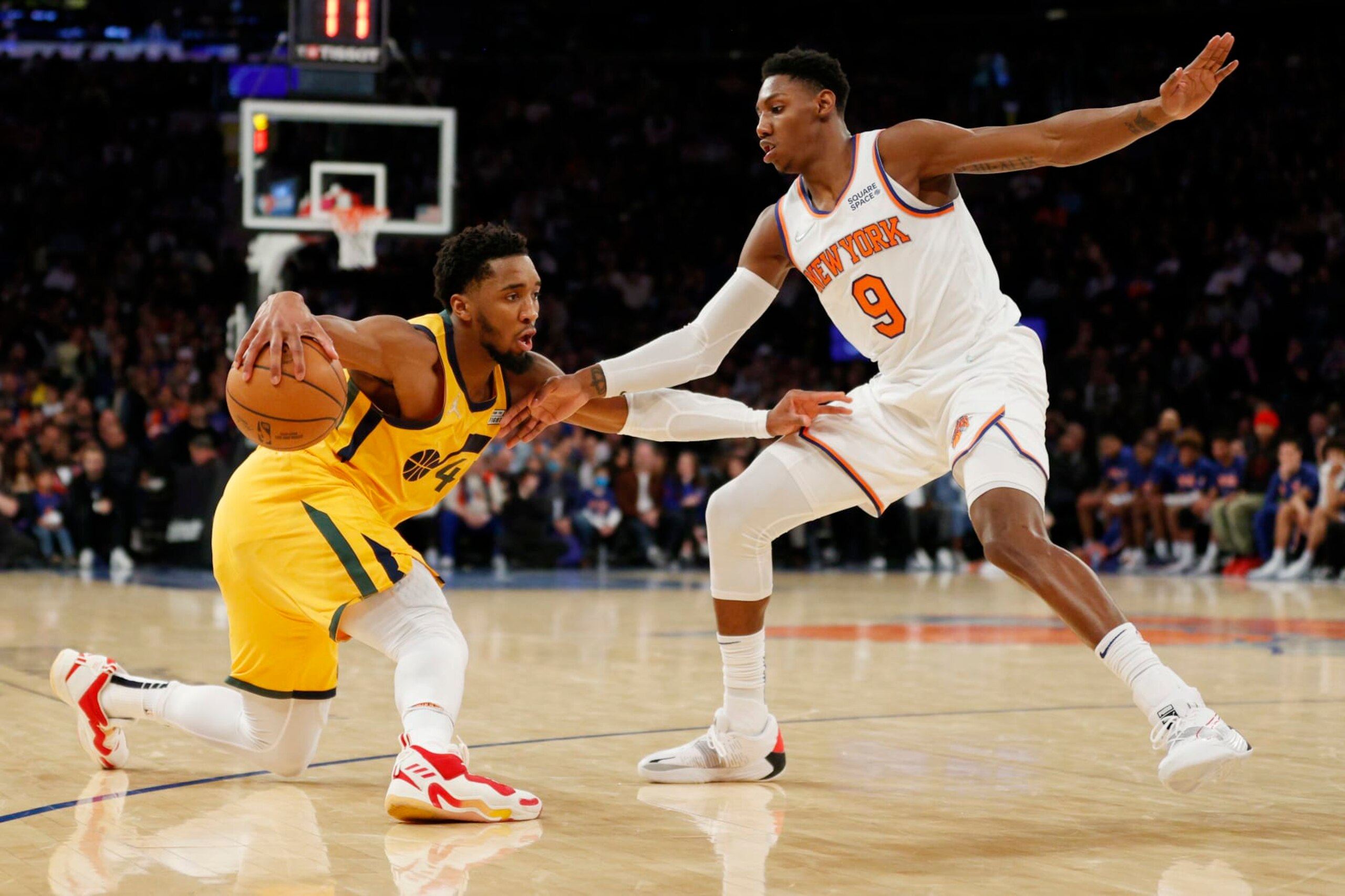 NEW YORK, NEW YORK - MARCH 20: Donovan Mitchell #45 of the Utah Jazz dribbles against RJ Barrett #9 of the New York Knicks during the second half at Madison Square Garden on March 20, 2022 in New York City. The Jazz won 108-93. NOTE TO USER: User expressly acknowledges and agrees that, by downloading and or using this photograph, User is consenting to the terms and conditions of the Getty Images License Agreement. (Photo by Sarah Stier/Getty Images) NEW YORK, NEW YORK - MARCH 20: Donovan Mitchell #45 of the Utah Jazz dribbles against RJ Barrett #9 of the New York Knicks during the second half at Madison Square Garden on March 20, 2022 in New York City. The Jazz won 108-93. NOTE TO USER: User expressly acknowledges and agrees that, by downloading and or using this photograph, User is consenting to the terms and conditions of the Getty Images License Agreement. (Photo by Sarah Stier/Getty Images)