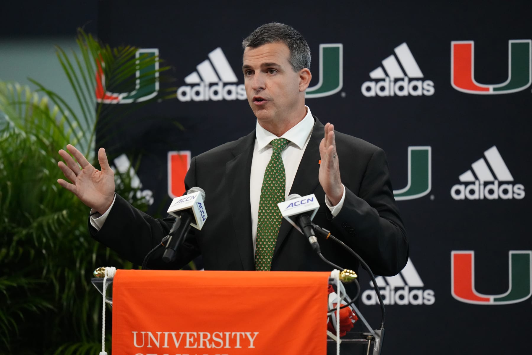 MIAMI, FLORIDA - DECEMBER 07: New Head Coach Mario Cristobal of the Miami Hurricanes speaks with the media during a press conference introducing him at the Carol Soffer Indoor Practice Facility at University of Miami on December 07, 2021 in Miami, Florida. Cristobal becomes the 26th head football coach in the programs history (Photo by Mark Brown/Getty Images)
