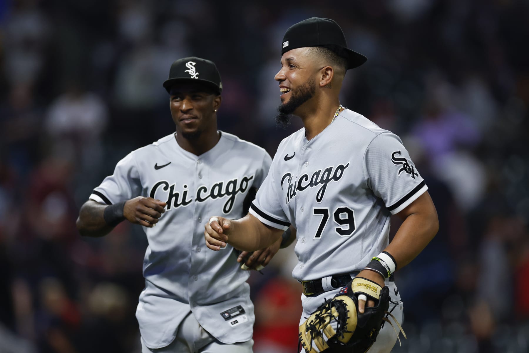 CLEVELAND, OH - JULY 13: Jose Abreu #79 and Tim Anderson #7 of the Chicago White Sox celebrate a 2-1 win against the Cleveland Guardians at Progressive Field on July 13, 2022 in Cleveland, Ohio. (Photo by Ron Schwane/Getty Images)