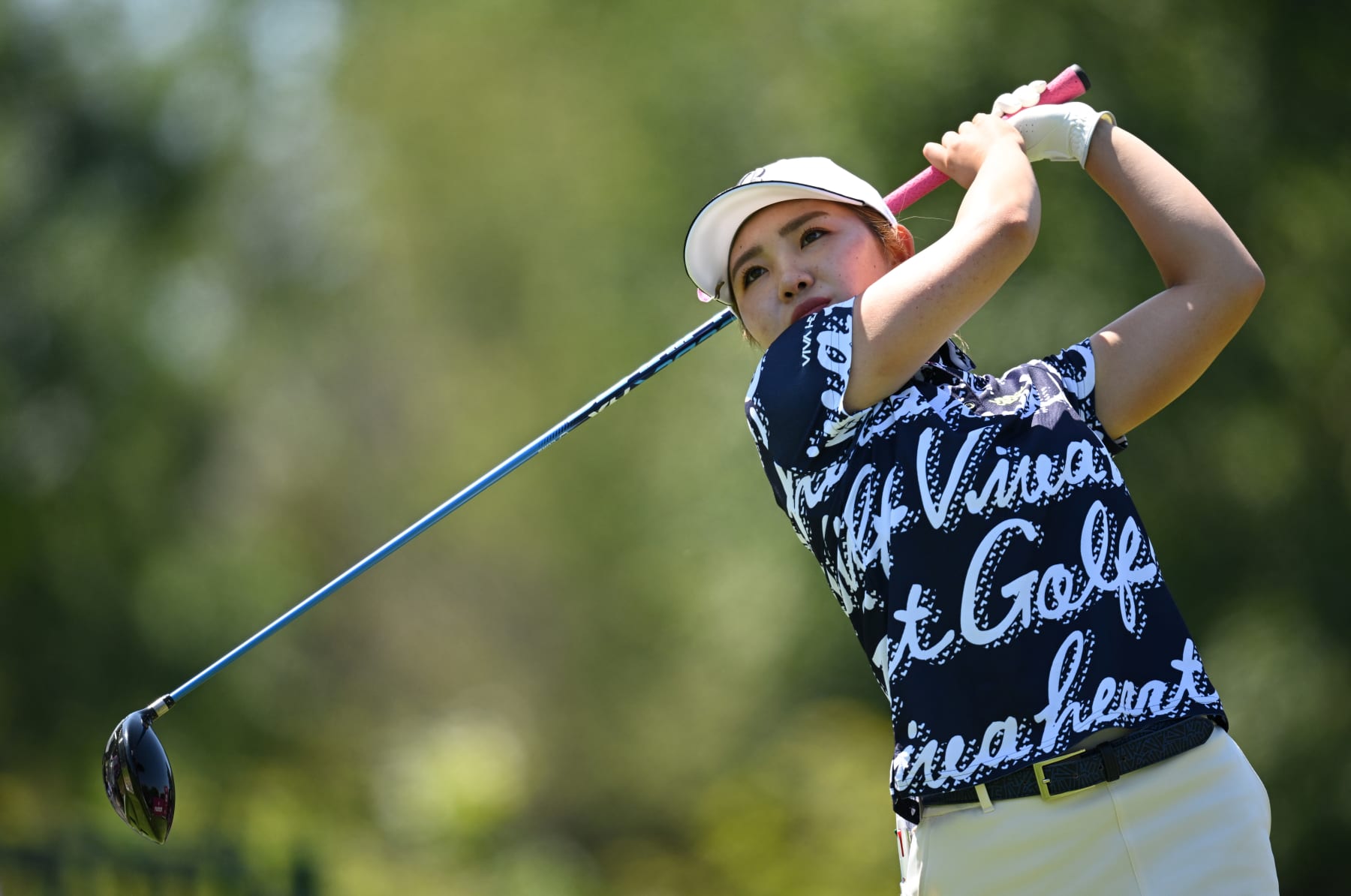 EVIAN-LES-BAINS, FRANCE - JULY 21: Ayaka Furue of Japan tees off on the 13th hole on day one of The Amundi Evian Championship at Evian Resort Golf Club on July 21, 2022 in Evian-les-Bains, France. (Photo by Stuart Franklin/Getty Images)