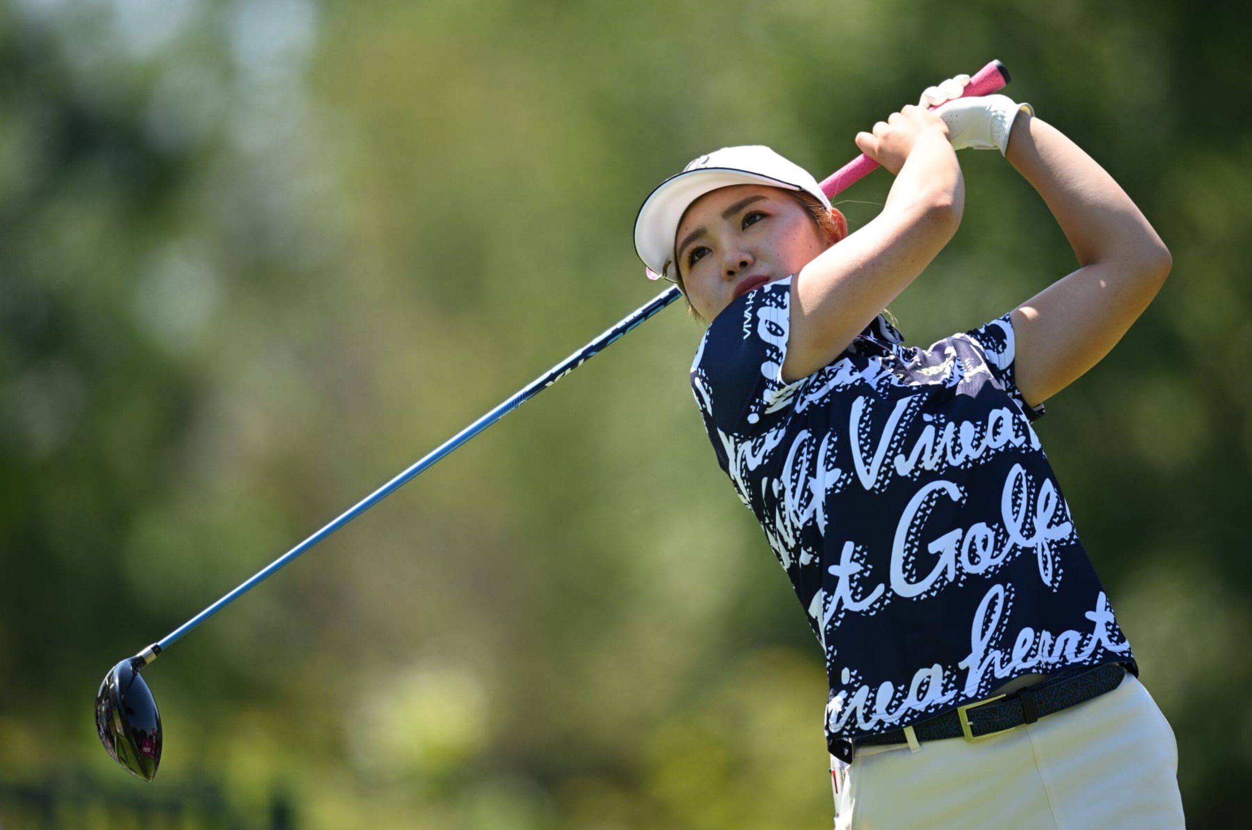 EVIAN-LES-BAINS, FRANCE - JULY 21: Ayaka Furue of Japan tees off on the 13th hole on day one of The Amundi Evian Championship at Evian Resort Golf Club on July 21, 2022 in Evian-les-Bains, France. (Photo by Stuart Franklin/Getty Images)