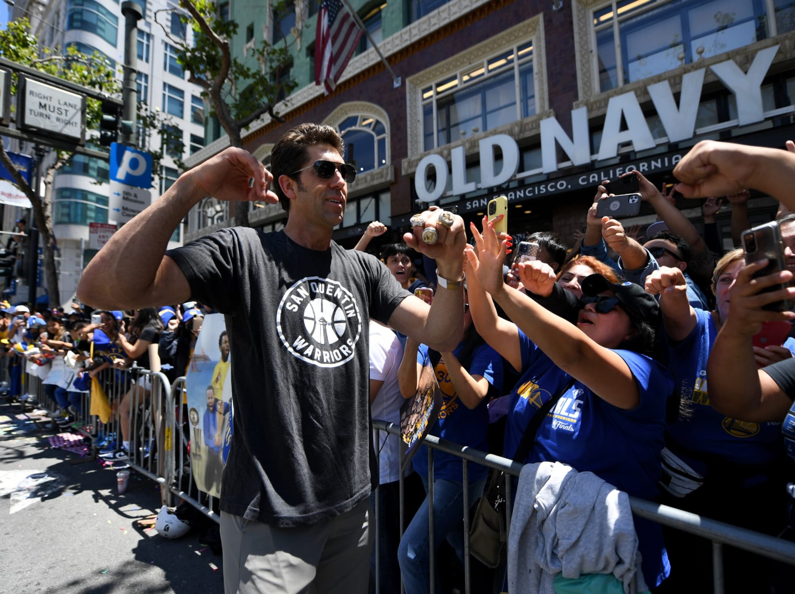 SAN FRANCISCO, CALIFORNIA - JUNE 20: General Manager Bob Myers of the Golden State Warriors celebrates with fans during the Victory Parade on June 20, 2022 in San Francisco, California. The Golden State Warriors beat the Boston Celtics 4-2 to win the 2022 NBA Finals. NOTE TO USER: User expressly acknowledges and agrees that, by downloading and or using this photograph, user is consenting to the terms and conditions of Getty Images License Agreement. (Photo by Michael Urakami/Getty Images)