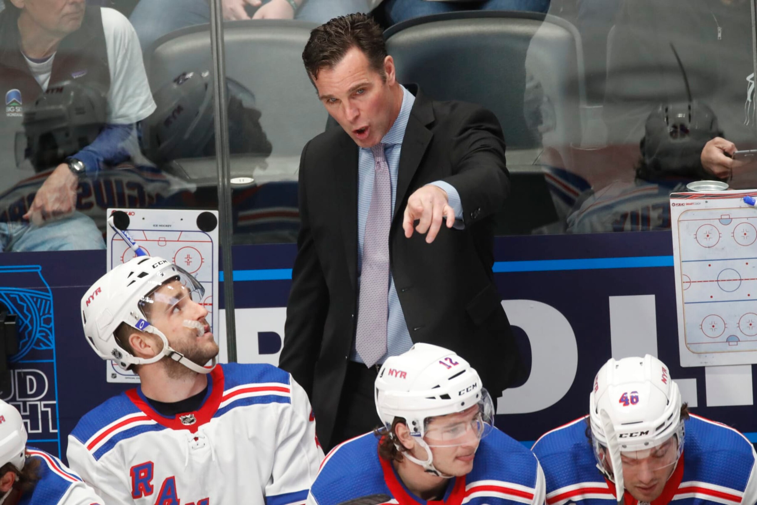 New York Rangers head coach David Quinn in the first period of an NHL hockey game Wednesday, March 11, 2020, in Denver. (AP Photo/David Zalubowski)