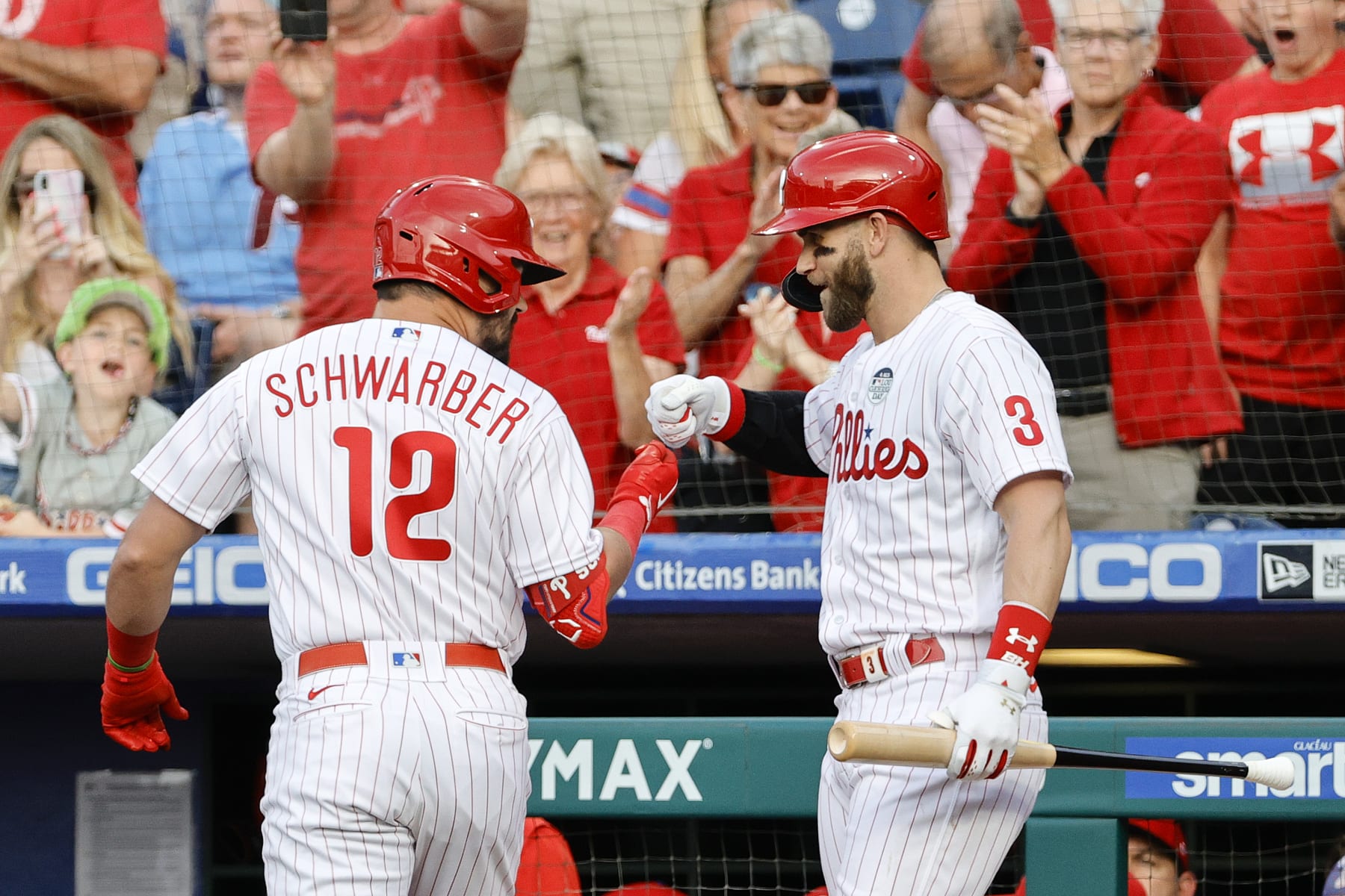 PHILADELPHIA, PENNSYLVANIA - JUNE 03: Kyle Schwarber #12 and Bryce Harper #3 of the Philadelphia Phillies celebrate a home run scored by Schwarber during the first inning against the Los Angeles Angels at Citizens Bank Park on June 03, 2022 in Philadelphia, Pennsylvania. (Photo by Tim Nwachukwu/Getty Images)