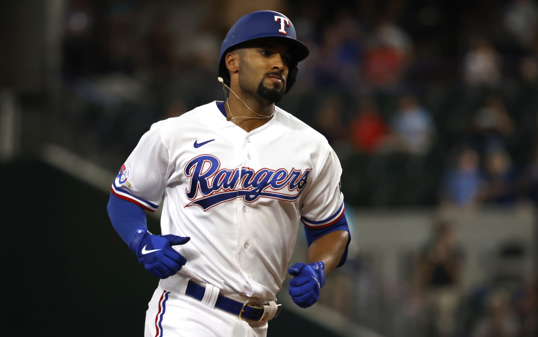 ARLINGTON, TX - JULY 12: Marcus Semien #2 of the Texas Rangers rounds the bases on his two-run home run against the Oakland Athletics in the first inning at Globe Life Field on July 12, 2022 in Arlington, Texas. (Photo by Ron Jenkins/Getty Images)