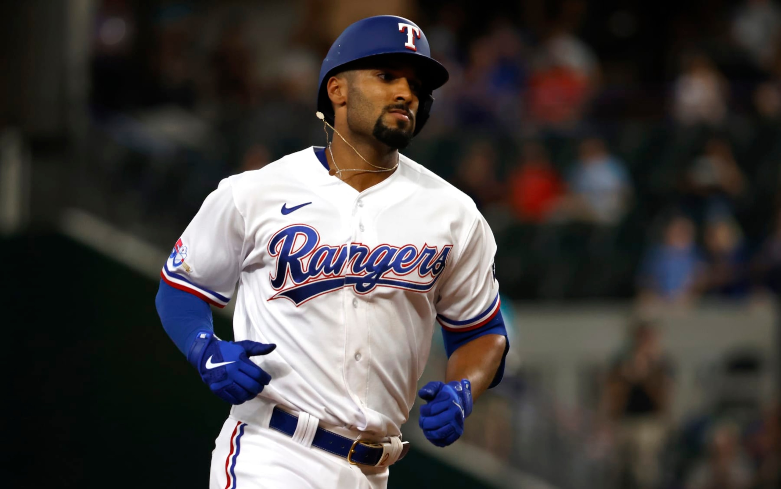 ARLINGTON, TX - JULY 12: Marcus Semien #2 of the Texas Rangers rounds the bases on his two-run home run against the Oakland Athletics in the first inning at Globe Life Field on July 12, 2022 in Arlington, Texas. (Photo by Ron Jenkins/Getty Images)