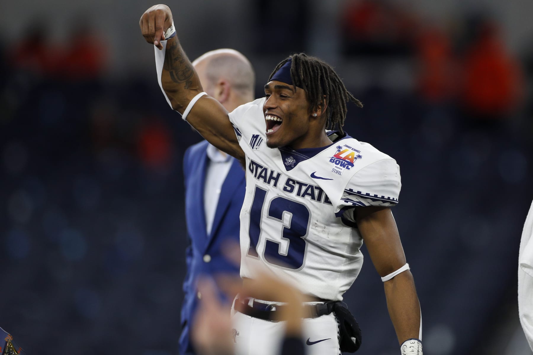 INGLEWOOD, CA - DECEMBER 18: Utah State Aggies wide receiver Deven Thompkins (13) celebrates after the Jimmy Kimmel LA Bowl college football game between the Utah State Aggies and the Oregon State Beavers on December 18, 2021, at SoFi Stadium in Inglewood, CA  (Photo by Brandon Sloter/Icon Sportswire via Getty Images)