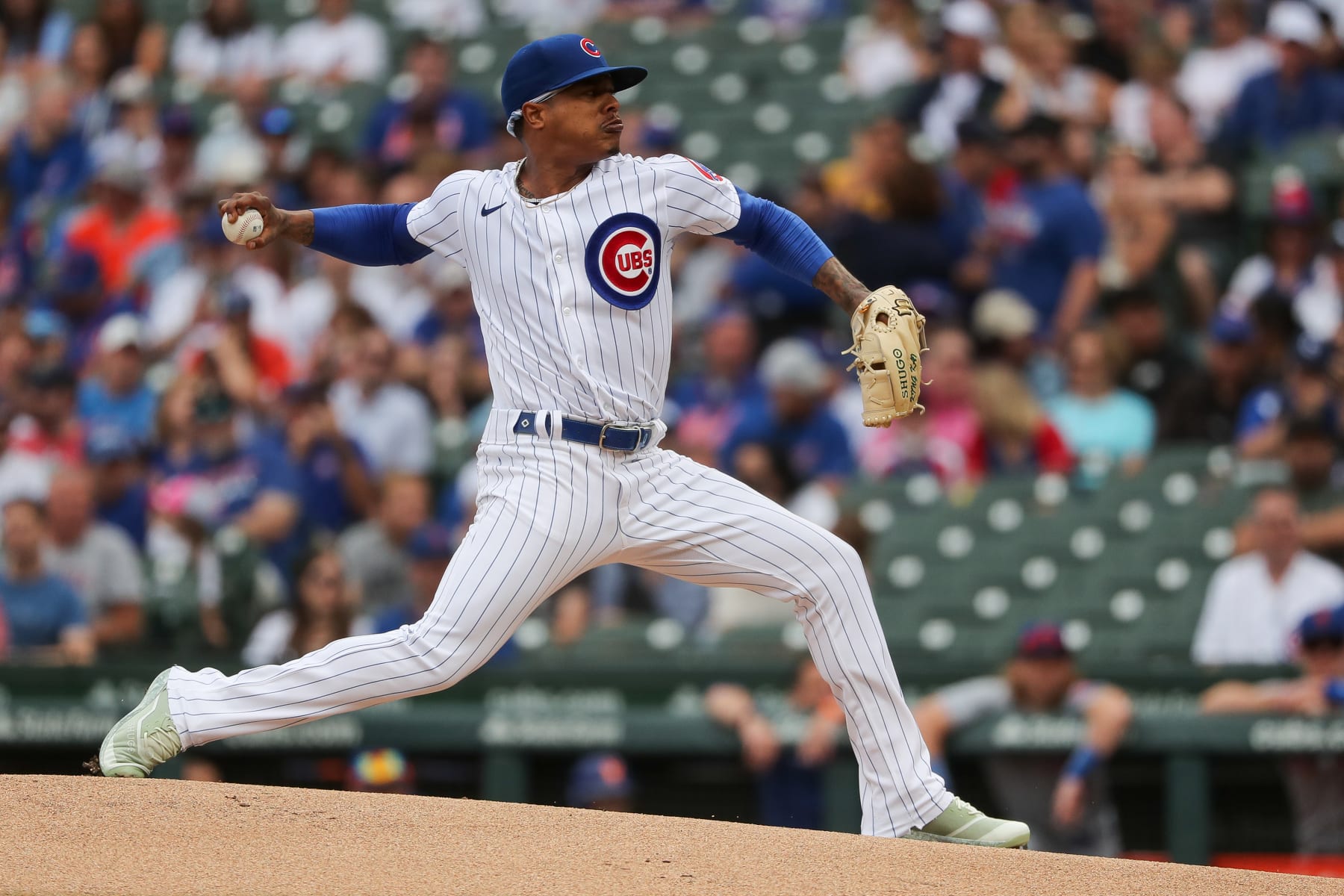 CHICAGO, ILLINOIS - JULY 16: Marcus Stroman #0 of the Chicago Cubs pitches in the first inning during game one of a doubleheader at Wrigley Field between the New York Mets and the Chicago Cubs on July 16, 2022 in Chicago, Illinois. (Photo by Chase Agnello-Dean/Getty Images)