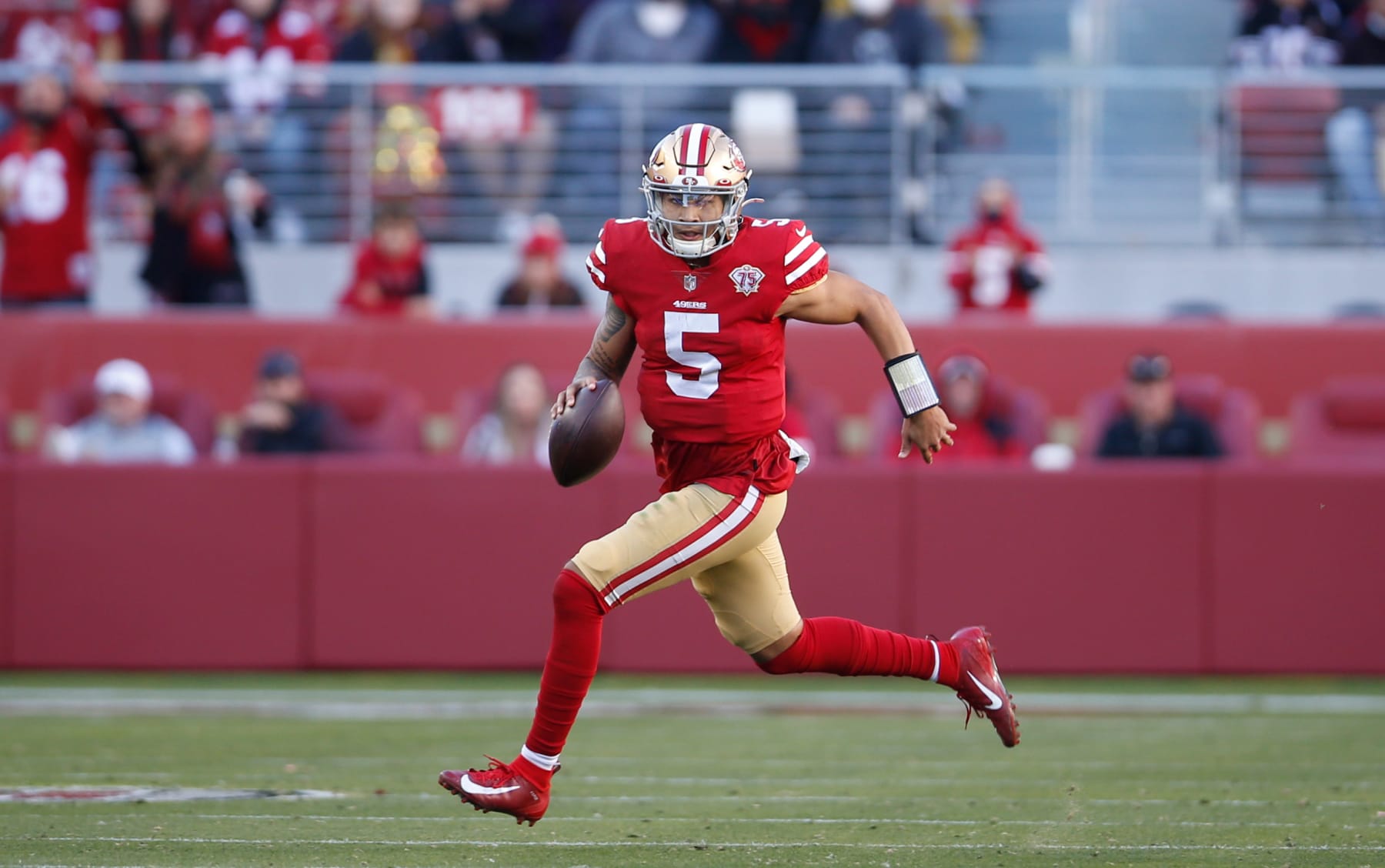 SANTA CLARA, CA - JANUARY 2: Trey Lance #5 of the San Francisco 49ers rushes during the game against the Houston Texans at Levi's Stadium on January 2, 2022 in Santa Clara, California. The 49ers defeated the Texans 23-7. (Photo by Michael Zagaris/San Francisco 49ers/Getty Images)