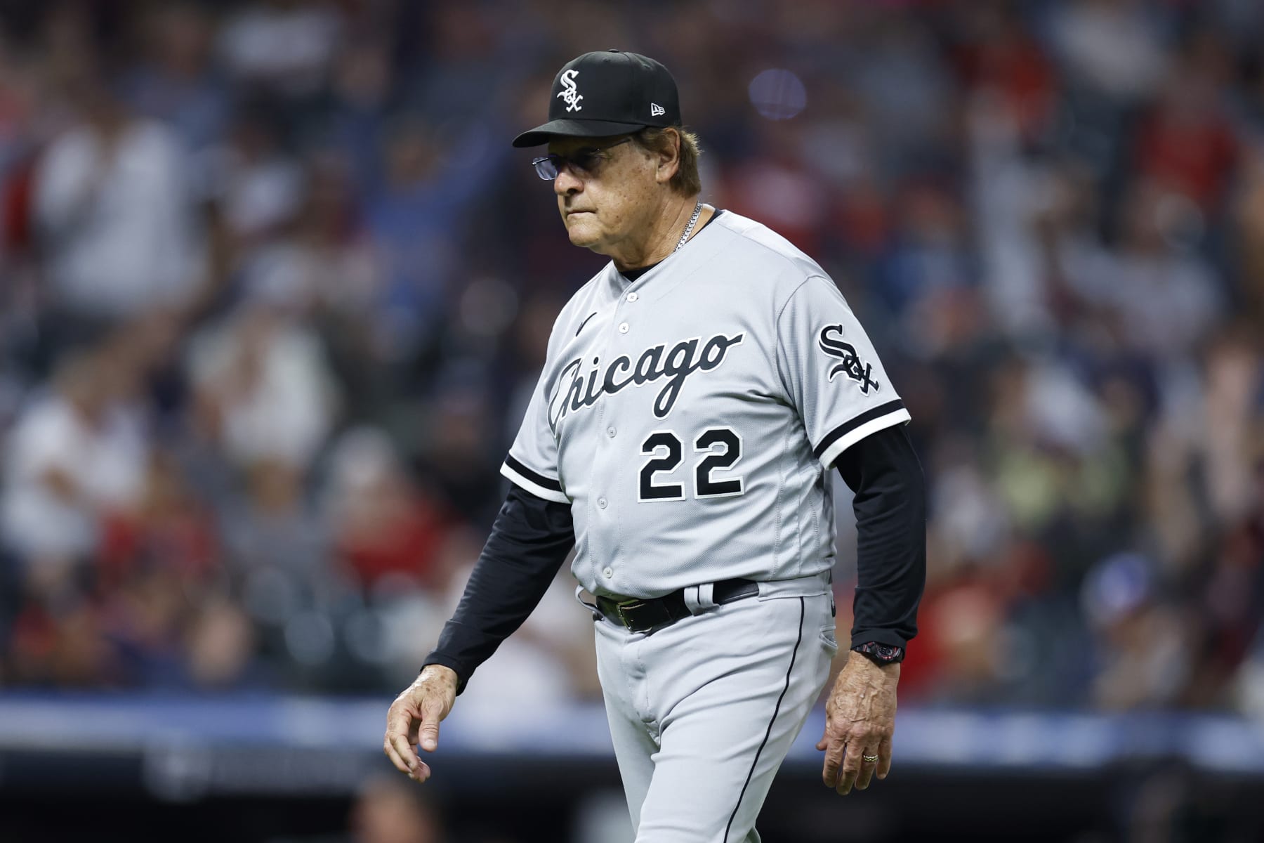 CLEVELAND, OH - JULY 13: Tony La Russa #22 of the Chicago White Sox walks back to the dugout after making a pitching change against the Cleveland Guardians during the seventh inning at Progressive Field on July 13, 2022 in Cleveland, Ohio. (Photo by Ron Schwane/Getty Images)