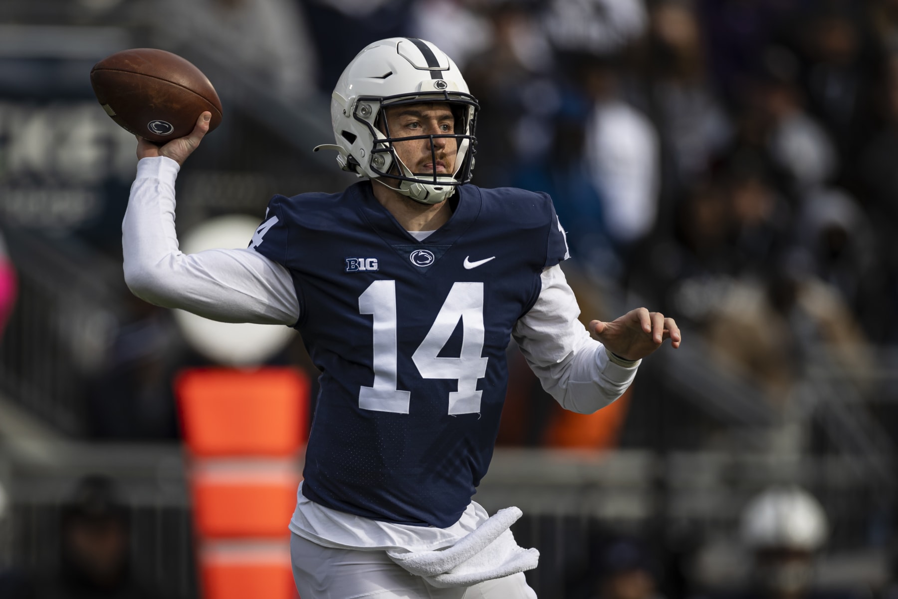 STATE COLLEGE, PA - NOVEMBER 20: Sean Clifford #14 of the Penn State Nittany Lions looks to pass against the Rutgers Scarlet Knights during the first half at Beaver Stadium on November 20, 2021 in State College, Pennsylvania. (Photo by Scott Taetsch/Getty Images)