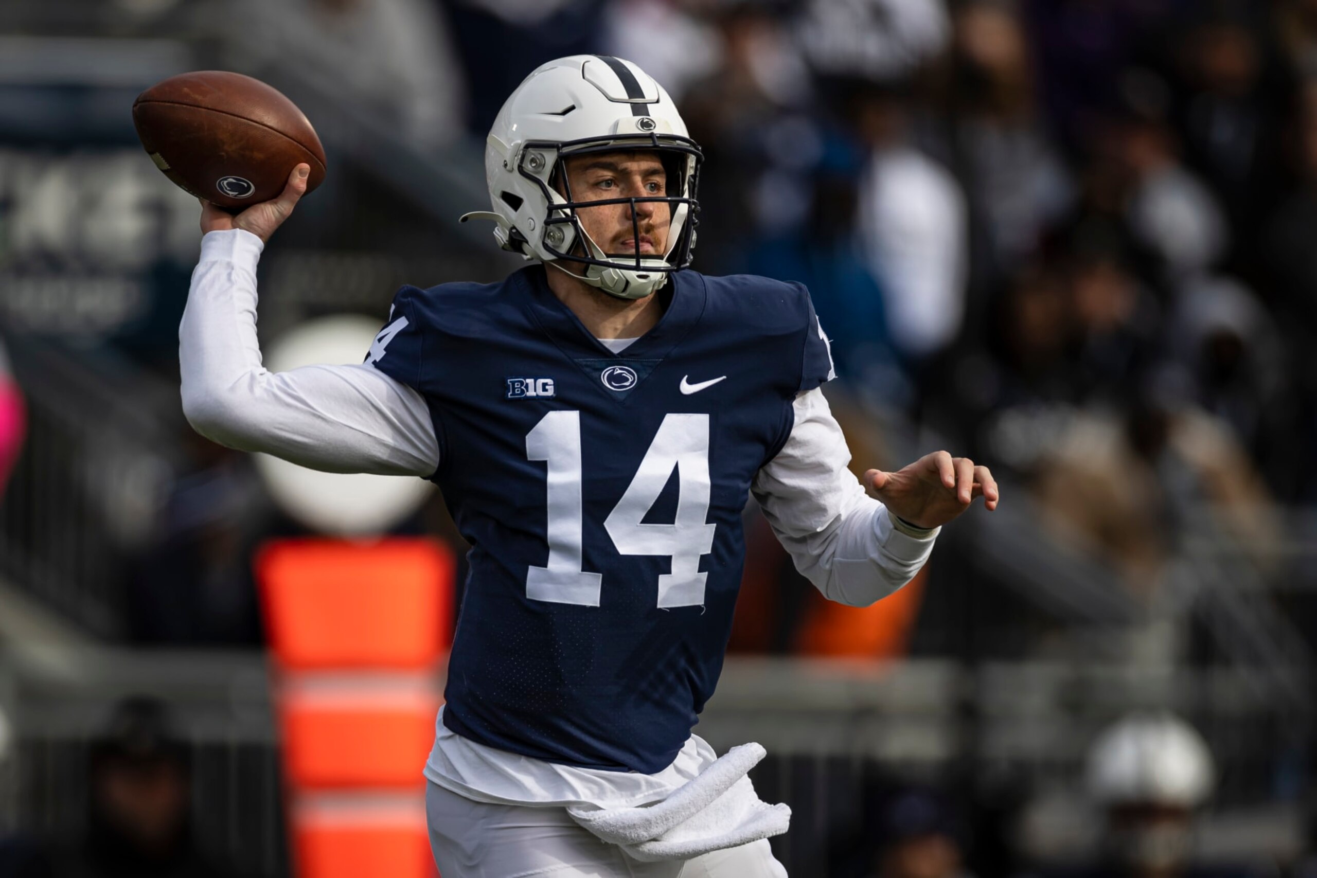STATE COLLEGE, PA - NOVEMBER 20: Sean Clifford #14 of the Penn State Nittany Lions looks to pass against the Rutgers Scarlet Knights during the first half at Beaver Stadium on November 20, 2021 in State College, Pennsylvania. (Photo by Scott Taetsch/Getty Images) STATE COLLEGE, PA - NOVEMBER 20: Sean Clifford #14 of the Penn State Nittany Lions looks to pass against the Rutgers Scarlet Knights during the first half at Beaver Stadium on November 20, 2021 in State College, Pennsylvania. (Photo by Scott Taetsch/Getty Images)