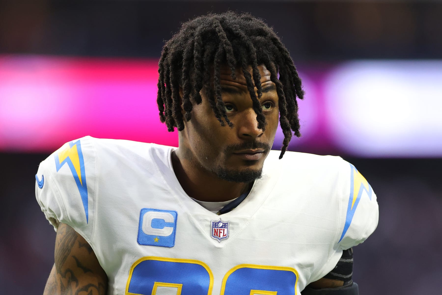 HOUSTON, TEXAS - DECEMBER 26: Derwin James #33 of the Los Angeles Chargers looks on against the Houston Texans at NRG Stadium on December 26, 2021 in Houston, Texas. (Photo by Carmen Mandato/Getty Images)