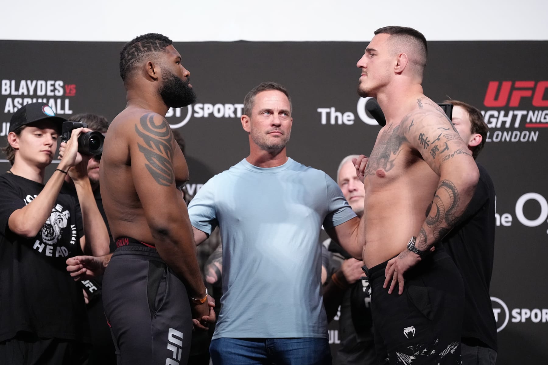 LONDON, ENGLAND - JULY 22:  (L-R) Curtis Blaydes and Tom Aspinall of England face off during the UFC Fight Night ceremonial weigh-in at O2 Arena on July 22, 2022 in London, England. (Photo by Jeff Bottari/Zuffa LLC)