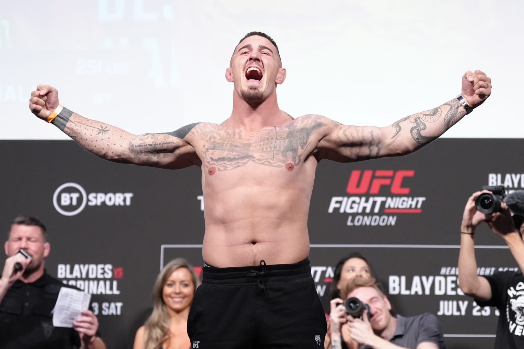 LONDON, ENGLAND - JULY 22:  Tom Aspinall of England poses on the scale during the UFC Fight Night ceremonial weigh-in at O2 Arena on July 22, 2022 in London, England. (Photo by Jeff Bottari/Zuffa LLC)