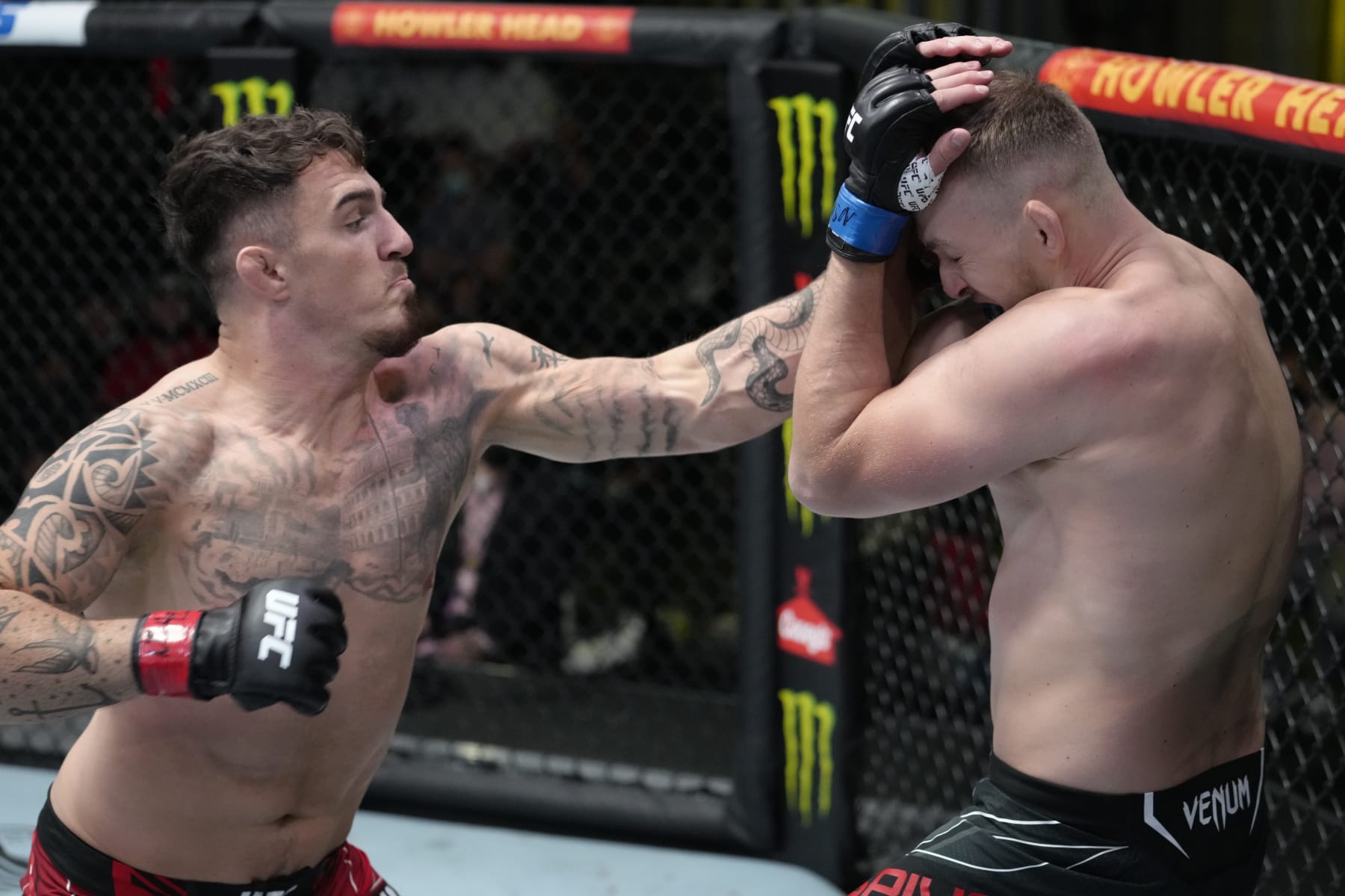 LAS VEGAS, NEVADA - SEPTEMBER 04: (L-R) Tom Aspinall of England punches Serghei Spivak of the Ukraine in their welterweight fight during the UFC Fight Night event at UFC APEX on September 04, 2021 in Las Vegas, Nevada. (Photo by Jeff Bottari/Zuffa LLC)