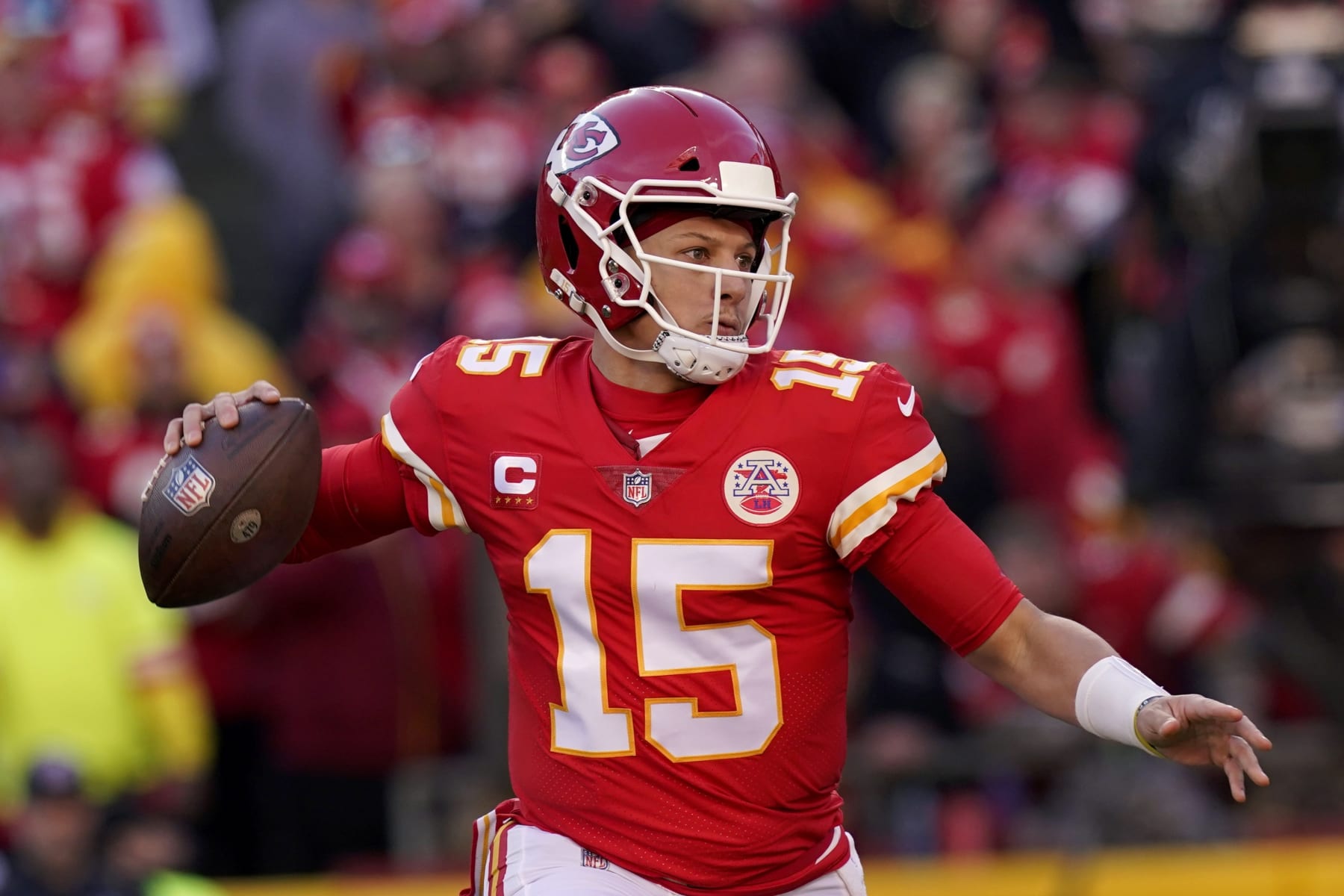 Kansas City Chiefs quarterback Patrick Mahomes (15) looks to pass during the first half of the AFC championship NFL football game against the Cincinnati Bengals, Sunday, Jan. 30, 2022, in Kansas City, Mo. (AP Photo/Eric Gay)