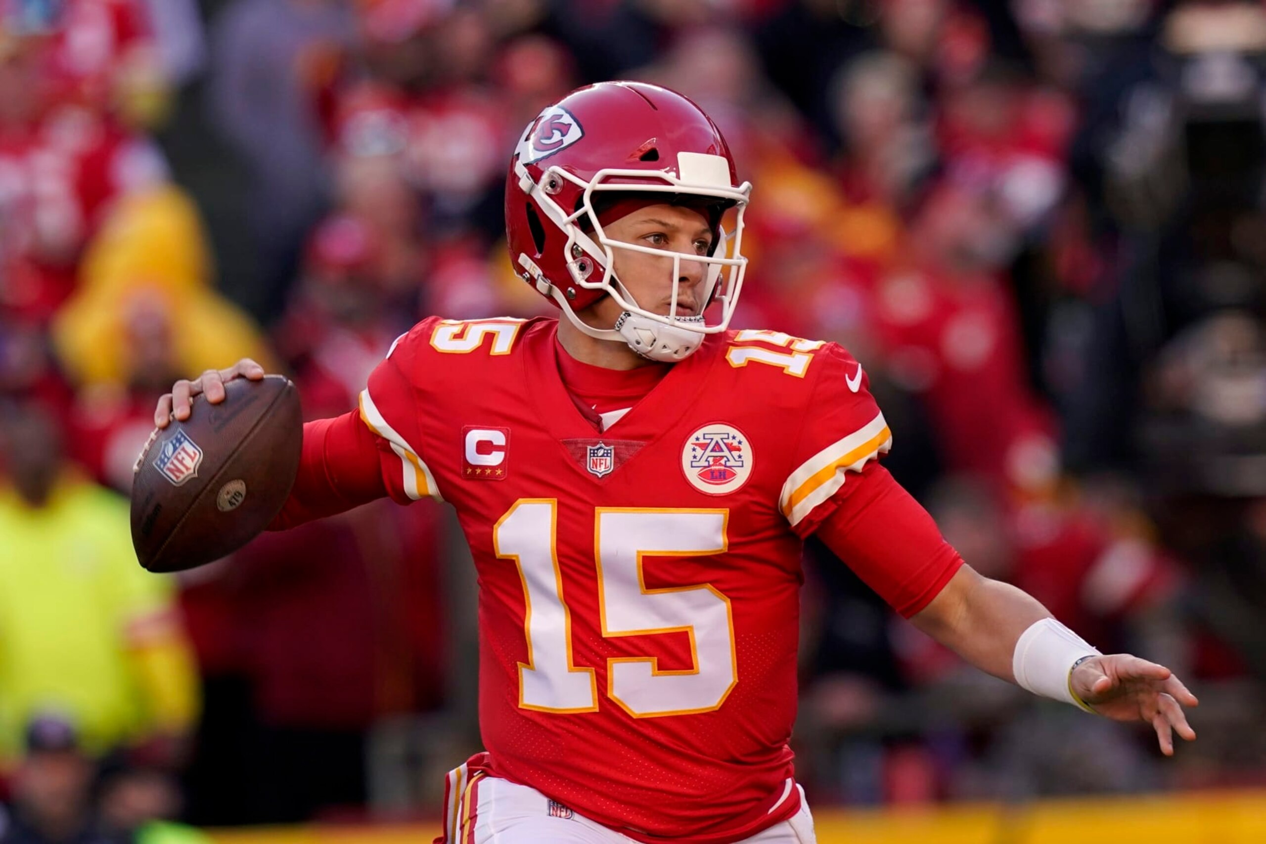 Kansas City Chiefs quarterback Patrick Mahomes (15) looks to pass during the first half of the AFC championship NFL football game against the Cincinnati Bengals, Sunday, Jan. 30, 2022, in Kansas City, Mo. (AP Photo/Eric Gay)