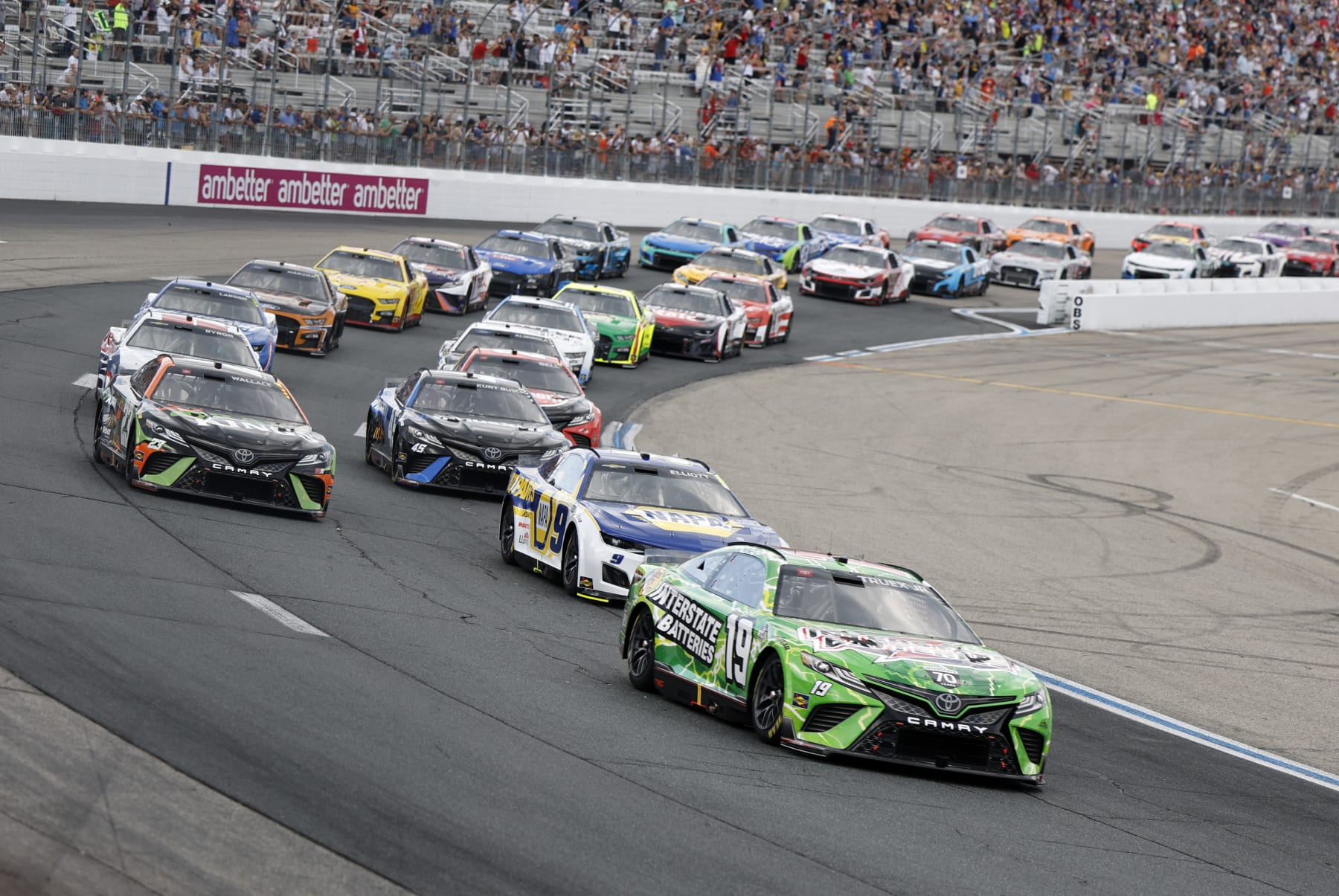 LOUDON, NH - JULY 17: Martin Truex Jr. (#19 Joe Gibbs Racing Interstate Batteries Toyota) leads the field during the NASCAR Cup Series Ambetter 301 on July 17, 2022, at New Hampshire Motor Speedway in Loudon. New Hampshire. (Photo by Fred Kfoury III/Icon Sportswire via Getty Images)