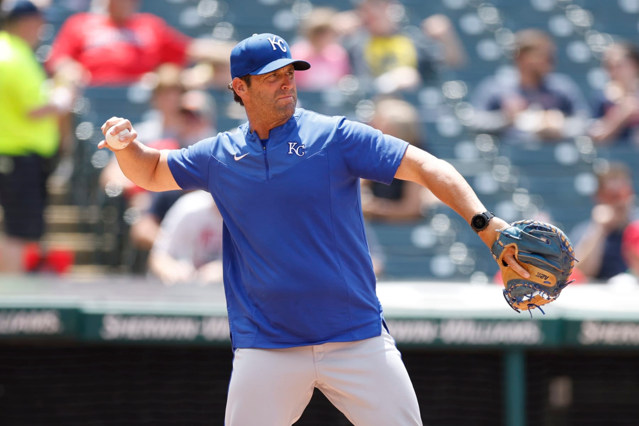 CLEVELAND, OH - JUNE 01: Manager Mike Matheny #22 of the Kansas City Royals warms up his pitcher during the fifth inning against the Cleveland Guardians at Progressive Field on June 01, 2022 in Cleveland, Ohio. (Photo by Ron Schwane/Getty Images)