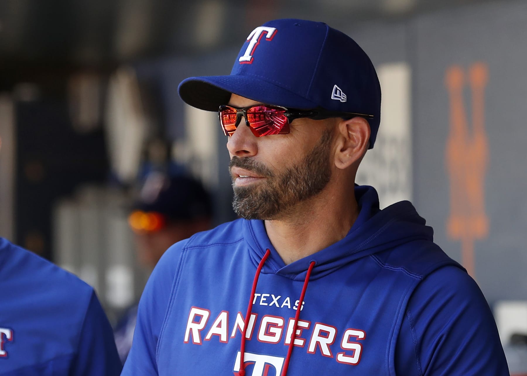 NEW YORK, NEW YORK - JULY 03:  Manager Chris Woodward #8 of the Texas Rangers looks on before a game against the New York Mets at Citi Field on July 03, 2022 in New York City. The Mets defeated the Rangers 4-1. (Photo by Jim McIsaac/Getty Images)