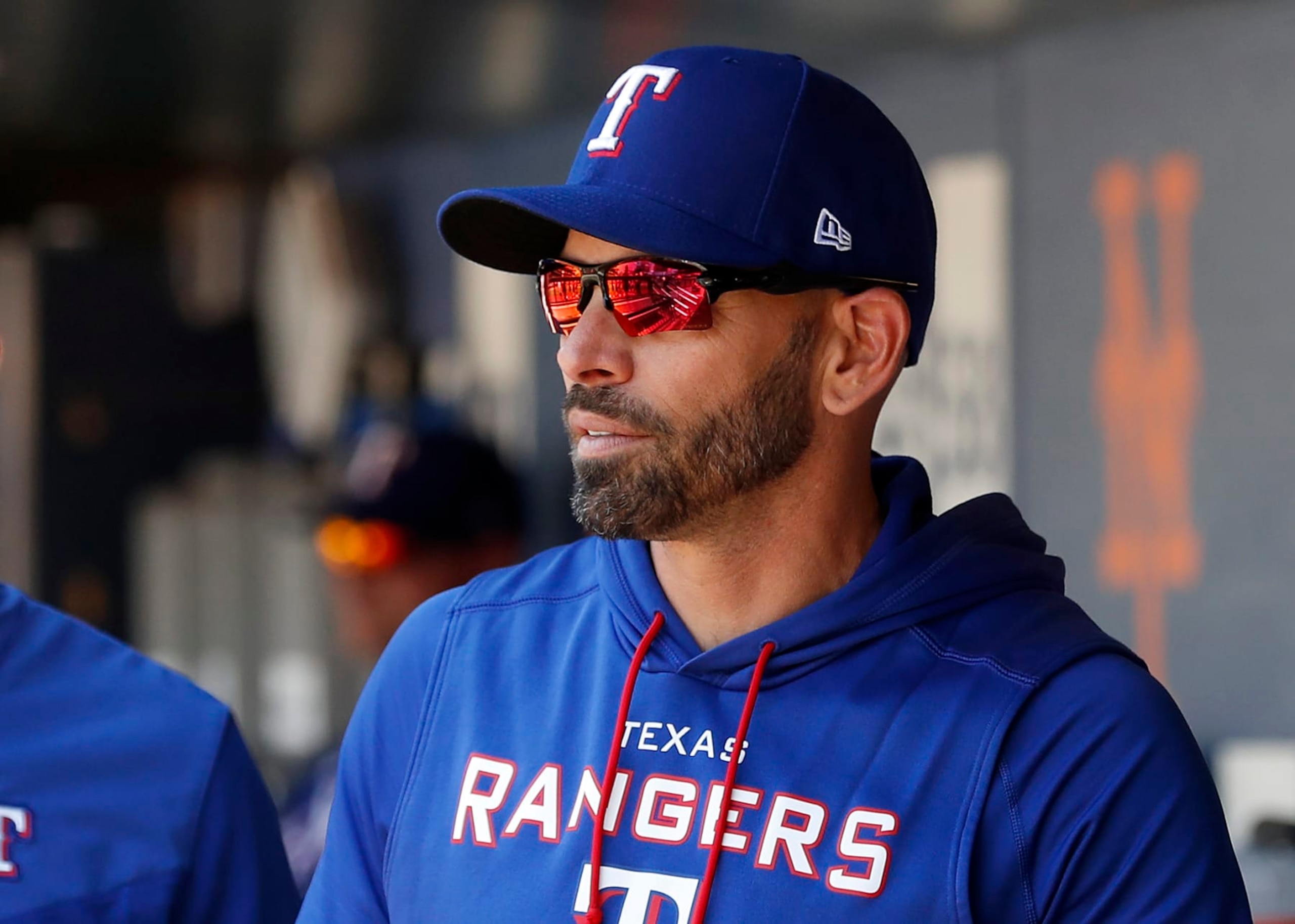 NEW YORK, NEW YORK - JULY 03:  Manager Chris Woodward #8 of the Texas Rangers looks on before a game against the New York Mets at Citi Field on July 03, 2022 in New York City. The Mets defeated the Rangers 4-1. (Photo by Jim McIsaac/Getty Images)