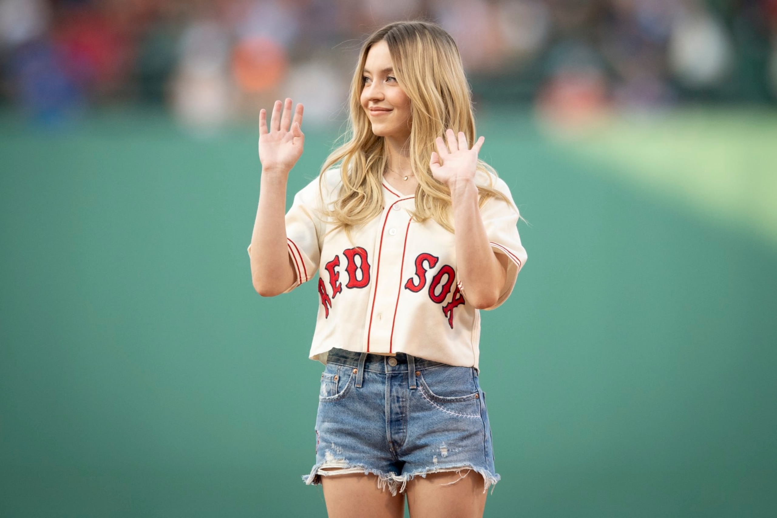 BOSTON, MA - JULY 22: Sydney Sweeney throws a ceremonial first pitch ahead of a game between the Toronto Blue Jays and the Boston Red Sox on July 22, 2022 at Fenway Park in Boston, Massachusetts. (Photo by Maddie Malhotra/Boston Red Sox/Getty Images) BOSTON, MA - JULY 22: Sydney Sweeney throws a ceremonial first pitch ahead of a game between the Toronto Blue Jays and the Boston Red Sox on July 22, 2022 at Fenway Park in Boston, Massachusetts. (Photo by Maddie Malhotra/Boston Red Sox/Getty Images)