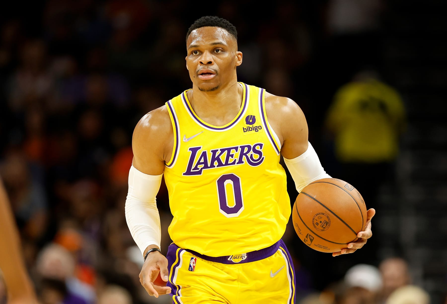 PHOENIX, ARIZONA - APRIL 05: Russell Westbrook #0 of the Los Angeles Lakers handles the ball during the first half of the NBA game at Footprint Center on April 05, 2022 in Phoenix, Arizona.  NOTE TO USER: User expressly acknowledges and agrees that, 
by downloading and or using this photograph, User is consenting to the terms and conditions of the Getty Images License Agreement. (Photo by Christian Petersen/Getty Images)
