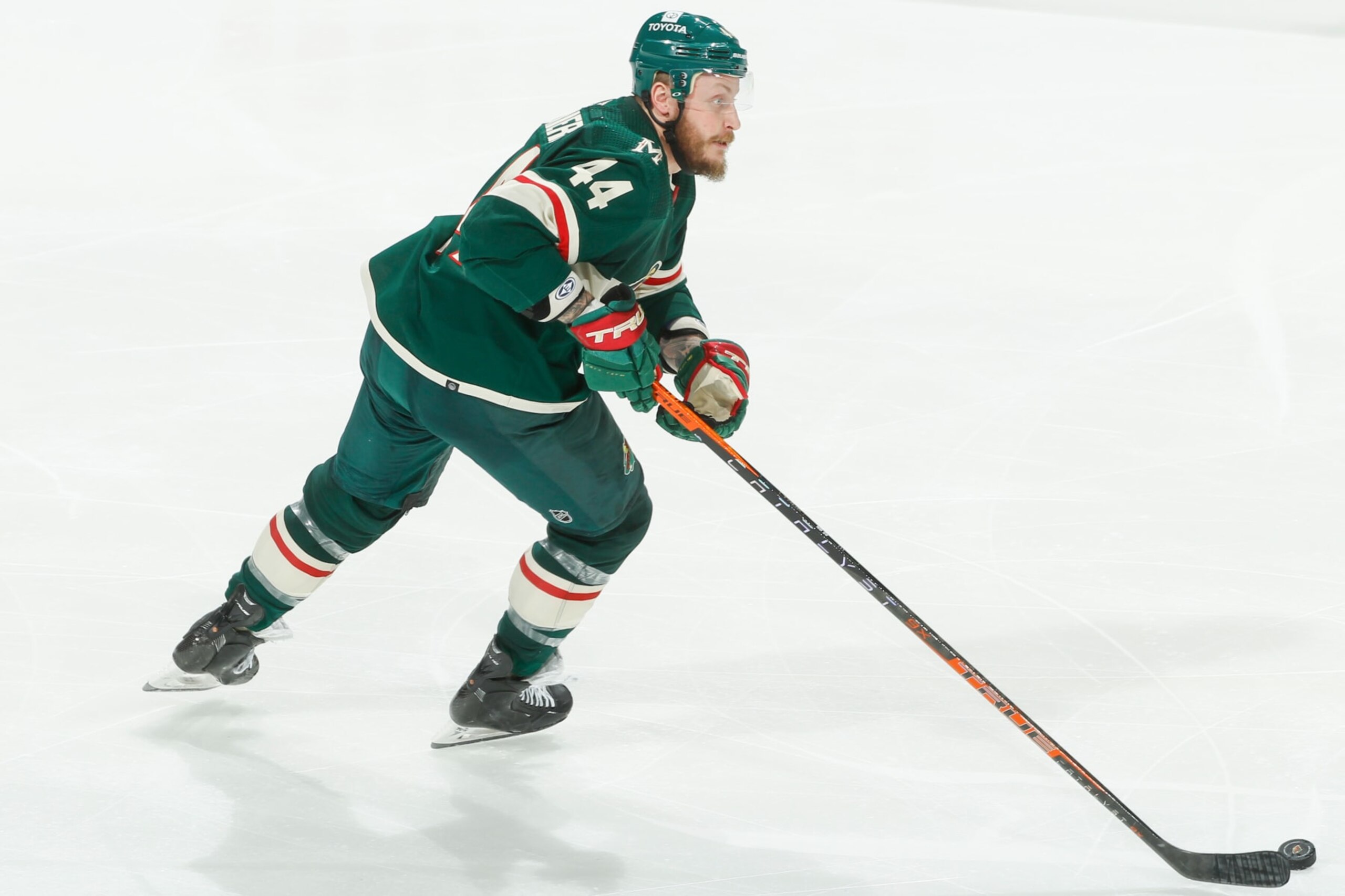 SAINT PAUL, MN - APRIL 17: Nicolas Deslauriers #44 of the Minnesota Wild skates with the puck against the San Jose Sharks during the game at the Xcel Energy Center on April 17, 2022 in Saint Paul, Minnesota. (Photo by Bruce Kluckhohn/NHLI via Getty Images) SAINT PAUL, MN - APRIL 17: Nicolas Deslauriers #44 of the Minnesota Wild skates with the puck against the San Jose Sharks during the game at the Xcel Energy Center on April 17, 2022 in Saint Paul, Minnesota. (Photo by Bruce Kluckhohn/NHLI via Getty Images)