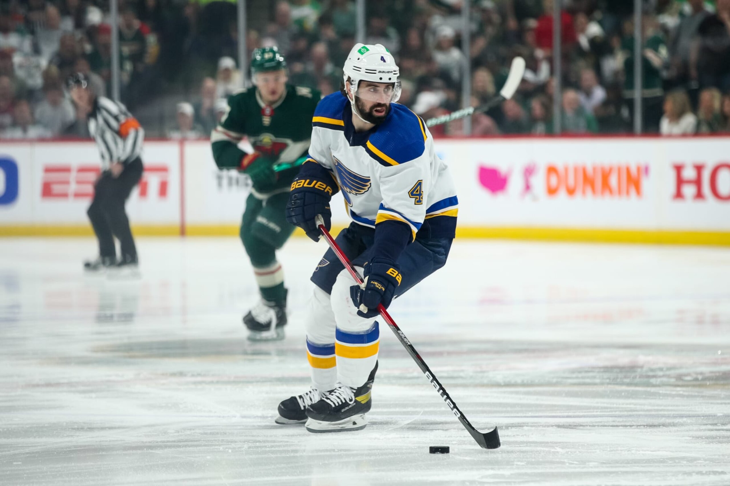 ST PAUL, MN - MAY 10: Nick Leddy #4 of the St. Louis Blues skates with the puck against the Minnesota Wild in the first period in Game Five of the First Round of the 2022 Stanley Cup Playoffs at Xcel Energy Center on May 10, 2022 in St Paul, Minnesota. (Photo by David Berding/Getty Images) ST PAUL, MN - MAY 10: Nick Leddy #4 of the St. Louis Blues skates with the puck against the Minnesota Wild in the first period in Game Five of the First Round of the 2022 Stanley Cup Playoffs at Xcel Energy Center on May 10, 2022 in St Paul, Minnesota. (Photo by David Berding/Getty Images)