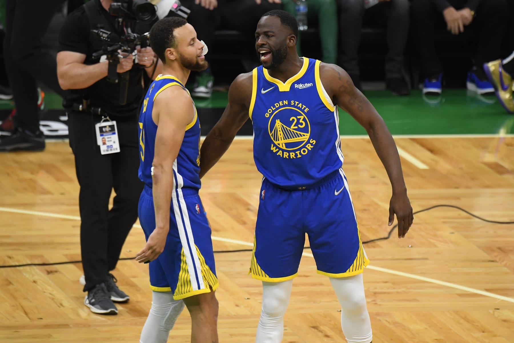 BOSTON, MA - JUNE 16: Stephen Curry #30 of the Golden State Warriors and Draymond Green #23 celebrate during Game Six of the 2022 NBA Finals on June 16, 2022 at TD Garden in Boston, Massachusetts. NOTE TO USER: User expressly acknowledges and agrees that, by downloading and or using this photograph, user is consenting to the terms and conditions of Getty Images License Agreement. Mandatory Copyright Notice: Copyright 2022 NBAE (Photo by Brian Babineau/NBAE via Getty Images)