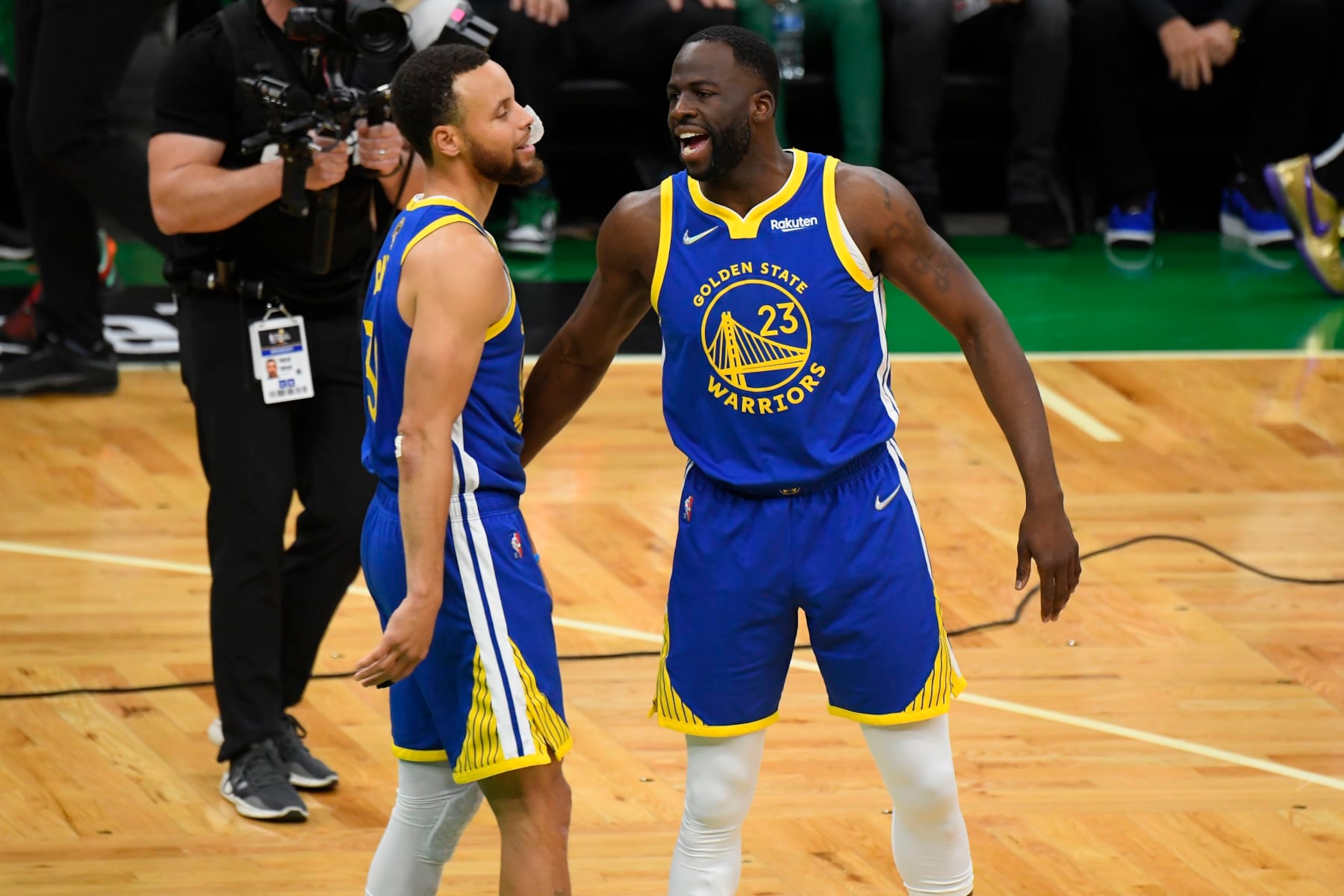 BOSTON, MA - JUNE 16: Stephen Curry #30 of the Golden State Warriors and Draymond Green #23 celebrate during Game Six of the 2022 NBA Finals on June 16, 2022 at TD Garden in Boston, Massachusetts. NOTE TO USER: User expressly acknowledges and agrees that, by downloading and or using this photograph, user is consenting to the terms and conditions of Getty Images License Agreement. Mandatory Copyright Notice: Copyright 2022 NBAE (Photo by Brian Babineau/NBAE via Getty Images)