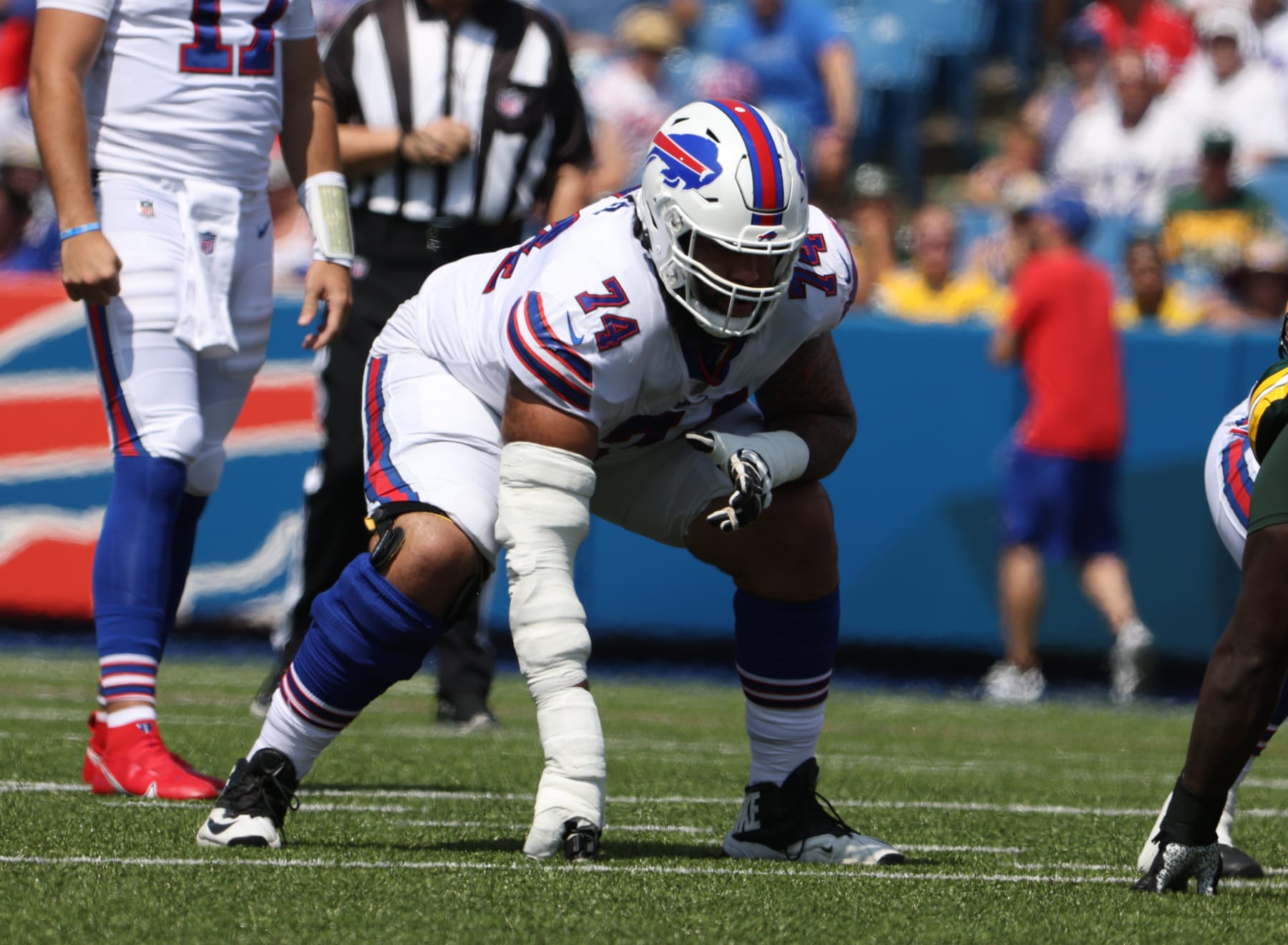 ORCHARD PARK, NY - AUGUST 28: Cody Ford #74 of the Buffalo Bills waits for the snap during the first half against the Green Bay Packers at Highmark Stadium on August 28, 2021 in Orchard Park, New York. (Photo by Timothy T Ludwig/Getty Images)