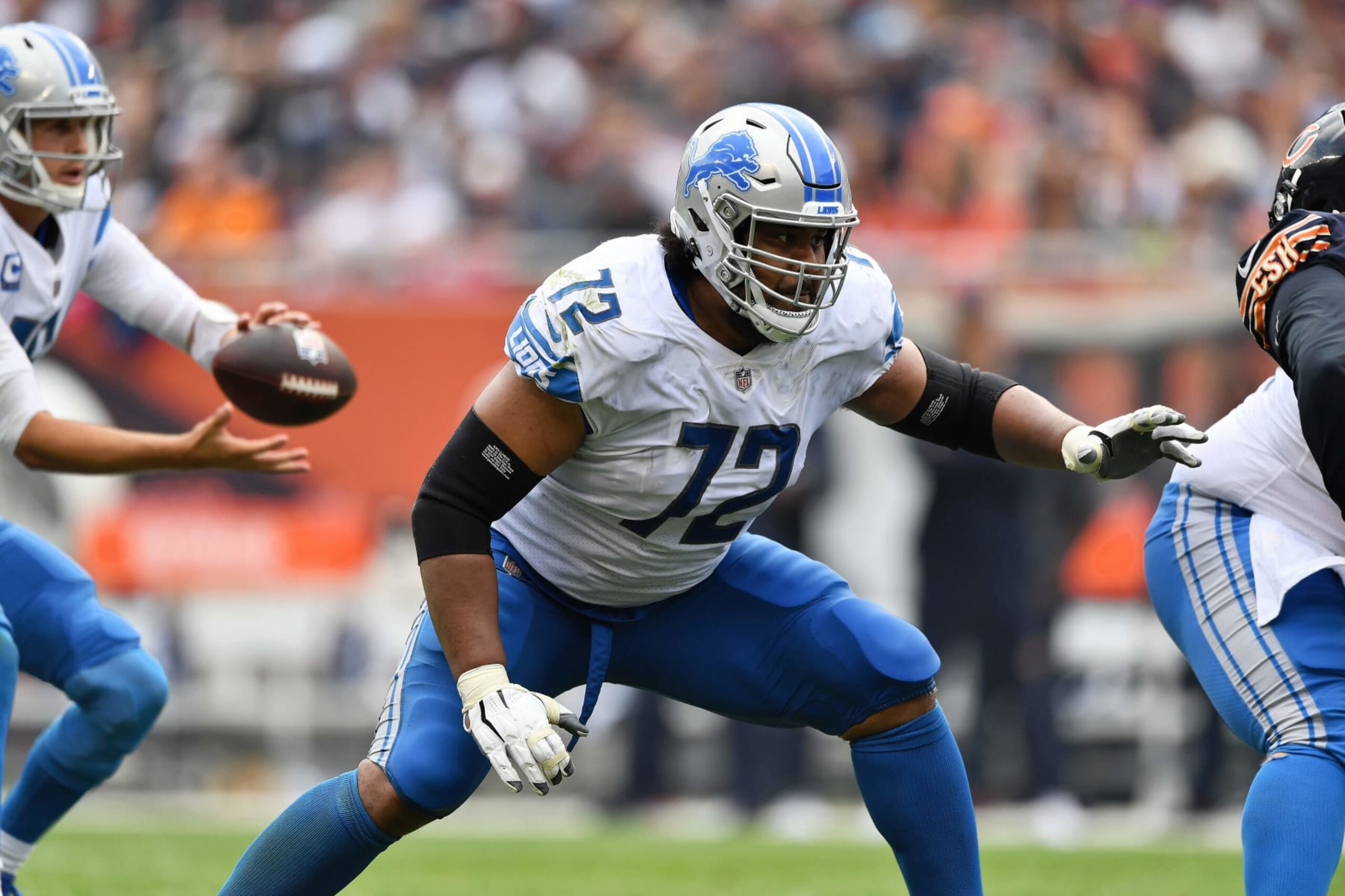 CHICAGO, ILLINOIS - OCTOBER 03:  Halapoulivaati Vaitai #72 of the Detroit Lions blocks against the Chicago Bears at Soldier Field on October 03, 2021 in Chicago, Illinois.  (Photo by Jamie Sabau/Getty Images)