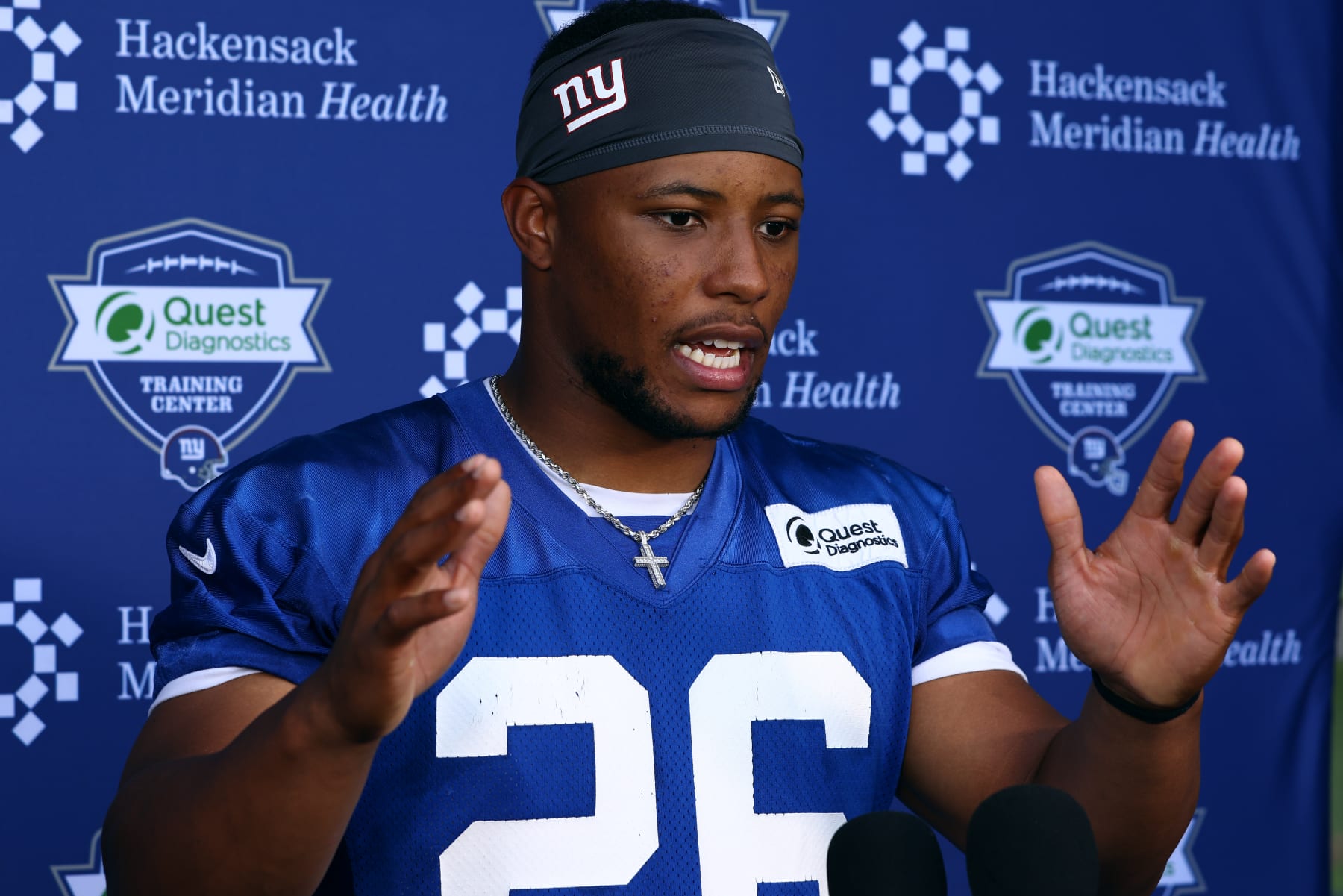 EAST RUTHERFORD, NJ - JUNE 08: Running back Saquon Barkley #26 of the New York Giants talks to the media after mandatory minicamp at Quest Diagnostics Training Center on June 8, 2022 in East Rutherford, New Jersey. (Photo by Rich Schultz/Getty Images) EAST RUTHERFORD, NJ - JUNE 08: Running back Saquon Barkley #26 of the New York Giants talks to the media after mandatory minicamp at Quest Diagnostics Training Center on June 8, 2022 in East Rutherford, New Jersey. (Photo by Rich Schultz/Getty Images)