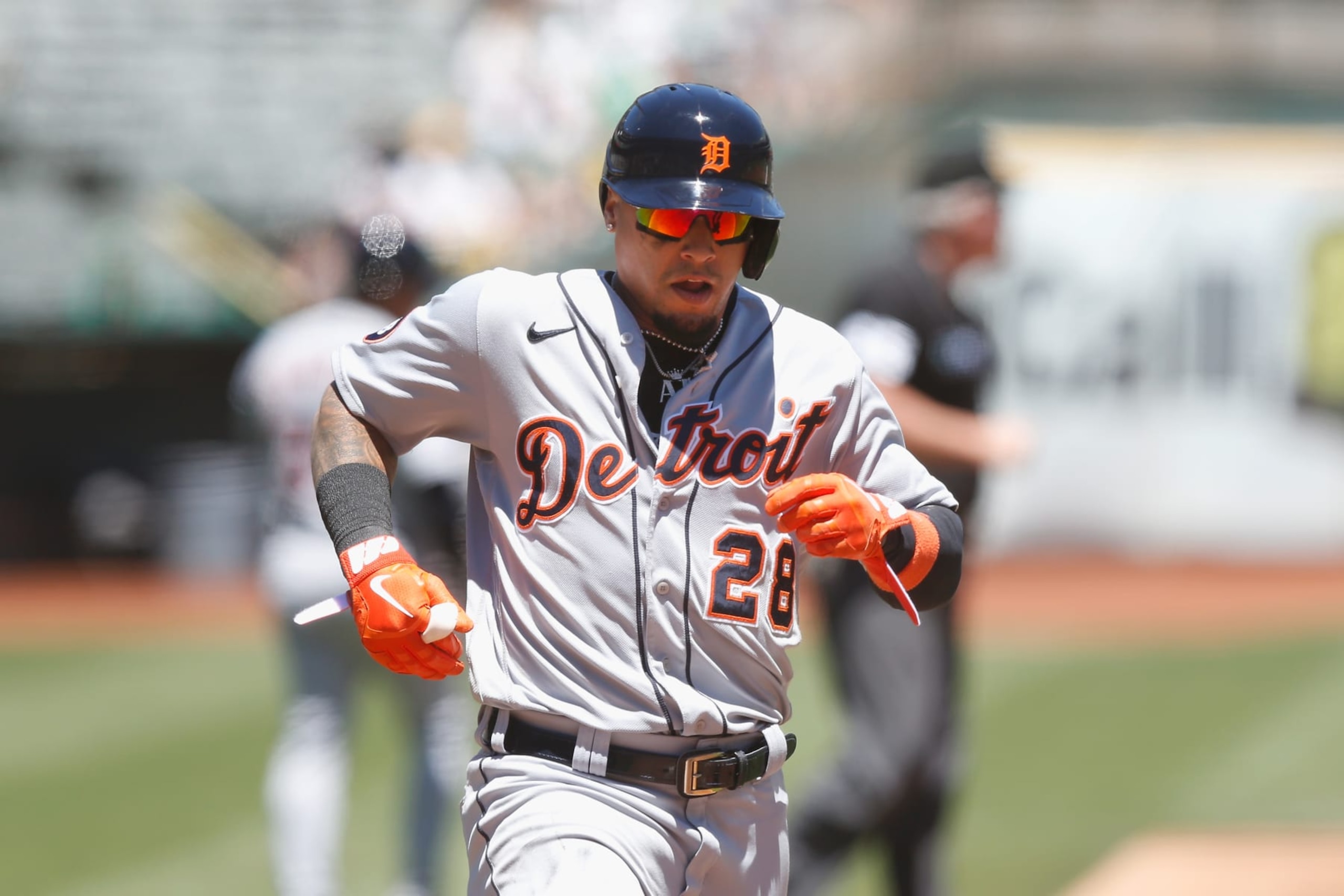 OAKLAND, CALIFORNIA - JULY 21: Javier Baez #28 of the Detroit Tigers crosses home plate to score on a double by Robbie Grossman in the top of the third inning during game one of a doubleheader at RingCentral Coliseum on July 21, 2022 in Oakland, California. (Photo by Lachlan Cunningham/Getty Images) OAKLAND, CALIFORNIA - JULY 21: Javier Baez #28 of the Detroit Tigers crosses home plate to score on a double by Robbie Grossman in the top of the third inning during game one of a doubleheader at RingCentral Coliseum on July 21, 2022 in Oakland, California. (Photo by Lachlan Cunningham/Getty Images)