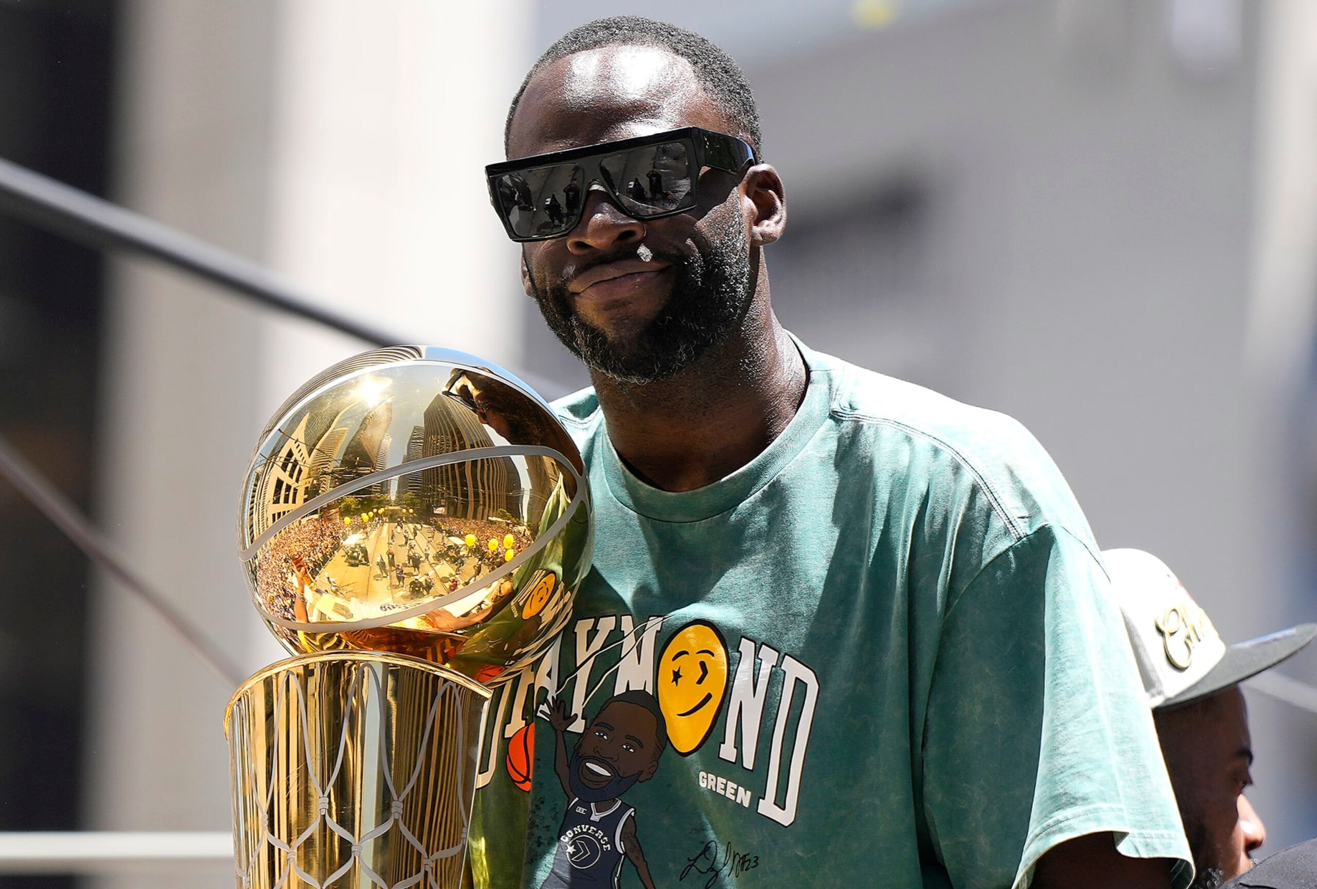 SAN FRANCISCO, CALIFORNIA - JUNE 20: Draymond Green #23 of the Golden State Warriors celebrates with the NBA Championship Trophy during the Golden State Warriors Victory Parade on June 20, 2022 in San Francisco, California. The Golden State Warriors beat the Boston Celtics 4-2 to win the 2022 NBA Finals. NOTE TO USER: User expressly acknowledges and agrees that, by downloading and or using this photograph, User is consenting to the terms and conditions of the Getty Images License Agreement. (Photo by Thearon W. Henderson/Getty Images)(Photo by Thearon W. Henderson/Getty Images) SAN FRANCISCO, CALIFORNIA - JUNE 20: Draymond Green #23 of the Golden State Warriors celebrates with the NBA Championship Trophy during the Golden State Warriors Victory Parade on June 20, 2022 in San Francisco, California. The Golden State Warriors beat the Boston Celtics 4-2 to win the 2022 NBA Finals. NOTE TO USER: User expressly acknowledges and agrees that, by downloading and or using this photograph, User is consenting to the terms and conditions of the Getty Images License Agreement. (Photo by Thearon W. Henderson/Getty Images)(Photo by Thearon W. Henderson/Getty Images)