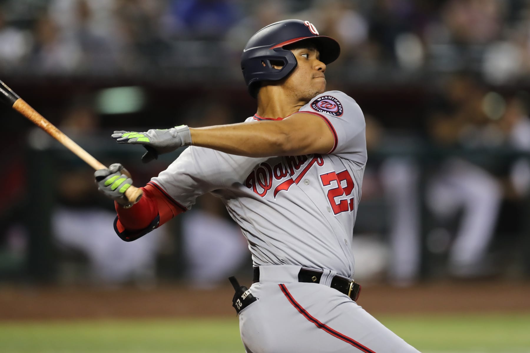 PHOENIX, ARIZONA - JULY 23: Right fielder Juan Soto #22 of the Washington Nationals swings during the MLB game against the Arizona Diamondbacks at Chase Field on July 23, 2022 in Phoenix, Arizona. (Photo by Rebecca Noble/Getty Images)