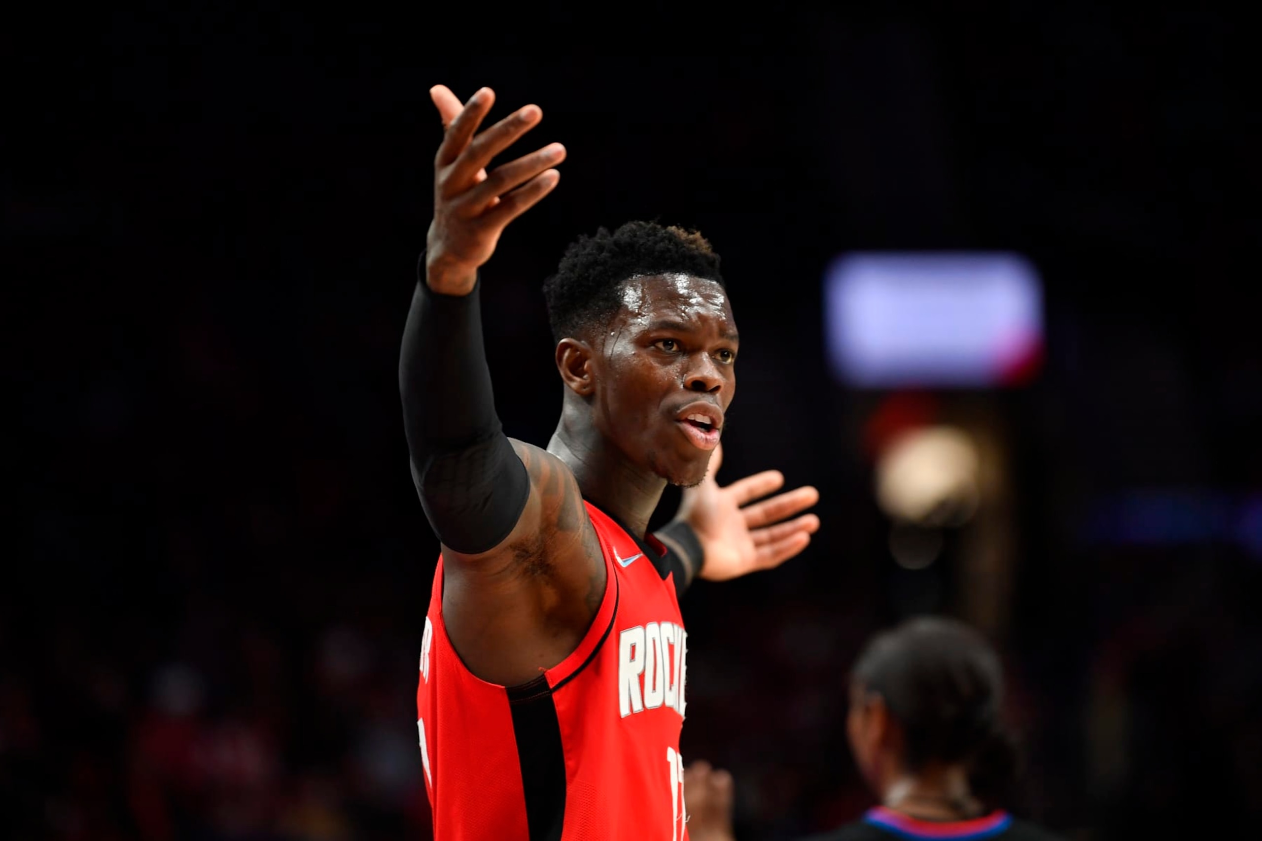 PORTLAND, OREGON - MARCH 26: Dennis Schroder #17 of the Houston Rockets gestures during the fourth quarter against the Portland Trail Blazers at the Moda Center on March 26, 2022 in Portland, Oregon. The Houston Rockets won 115-98. NOTE TO USER: User expressly acknowledges and agrees that, by downloading and or using this photograph, User is consenting to the terms and conditions of the Getty Images License Agreement. (Photo by Alika Jenner/Getty Images)