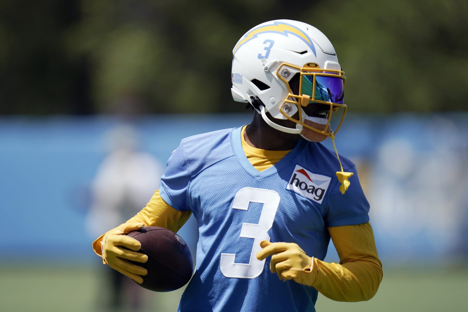 Los Angeles Chargers safety Derwin James Jr. carries the ball during practice at the NFL football team's practice facility Wednesday, June 15, 2022, in Costa Mesa, Calif. (AP Photo/Jae C. Hong)