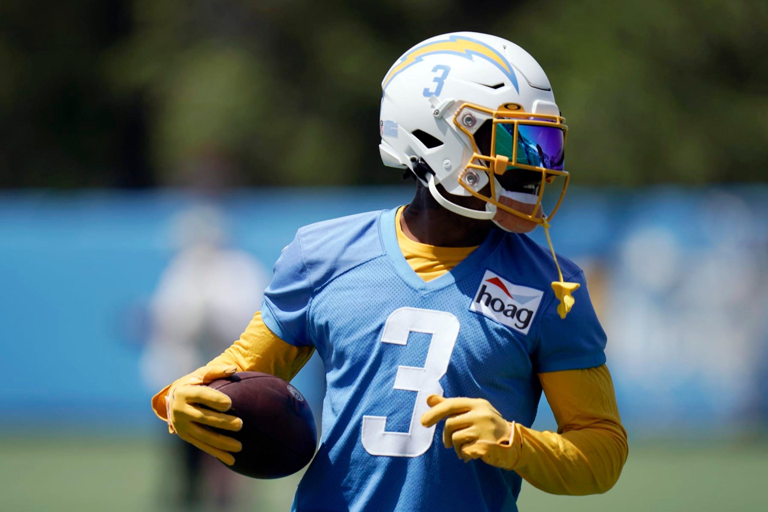 Los Angeles Chargers safety Derwin James Jr. carries the ball during practice at the NFL football team's practice facility Wednesday, June 15, 2022, in Costa Mesa, Calif. (AP Photo/Jae C. Hong)