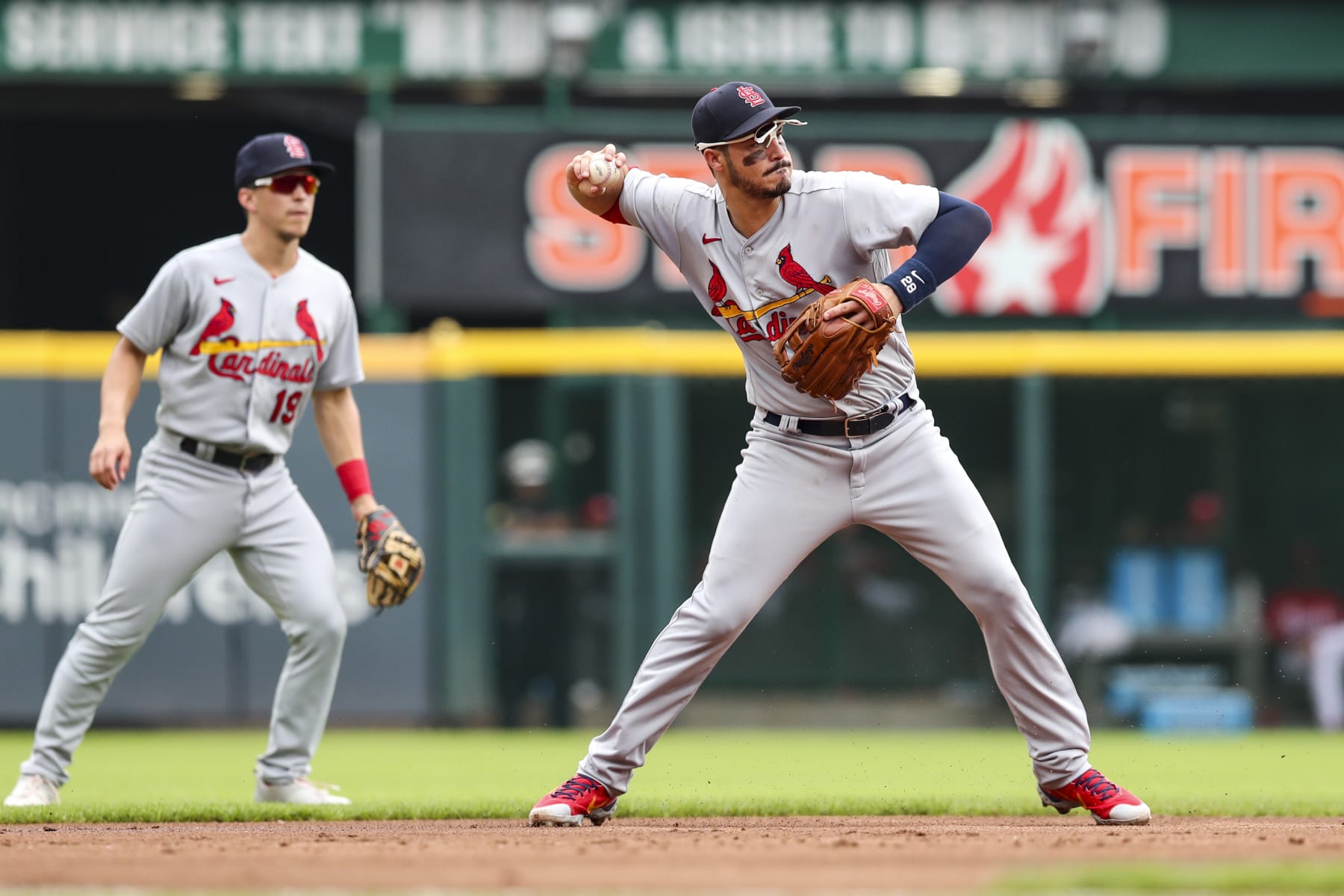 CINCINNATI, OH - JULY 24: Nolan Arenado #28 of the St. Louis Cardinals throws out Kyle Farmer #17 of the Cincinnati Reds at first in the bottom of the second inning at Great American Ball Park on July 24, 2022 in Cincinnati, Ohio. (Photo by Lauren Bacho/Getty Images)