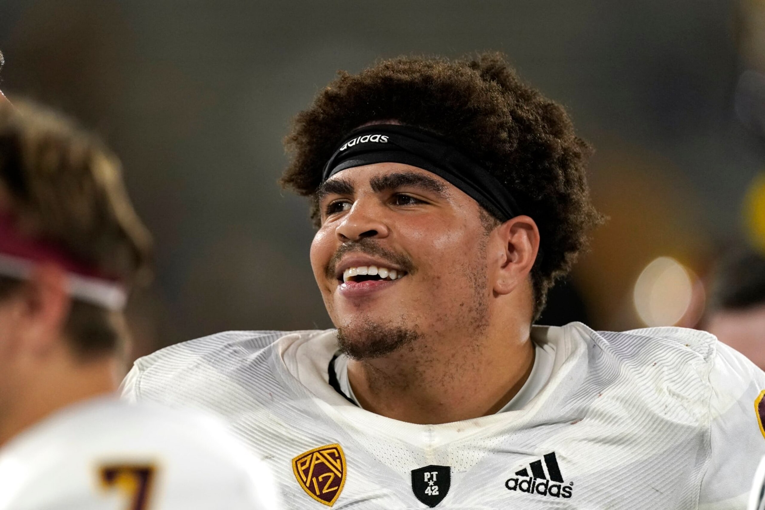 Arizona State offensive lineman Dohnovan West smiles from the sideline during the second half of an NCAA college football game against UCLA Saturday, Oct. 2, 2021, in Pasadena, Calif. Arizona State won 42-23. (AP Photo/Mark J. Terrill)