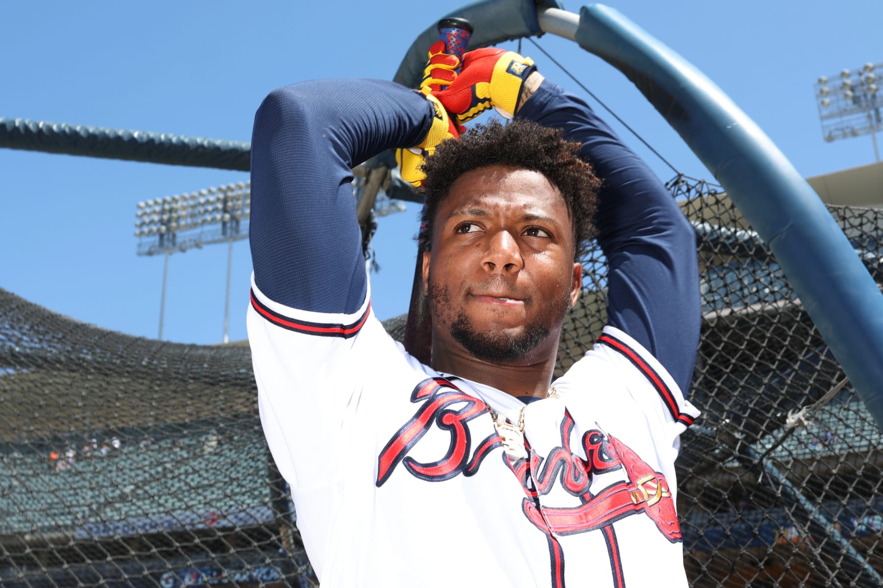 LOS ANGELES, CA - JULY 18: Ronald Acuña Jr. #13 of the Atlanta Braves stretches during the Gatorade All-Star Workout Day at Dodger Stadium on Monday, July 18, 2022 in Los Angeles, California. (Photo by Rob Tringali/MLB Photos via Getty Images)