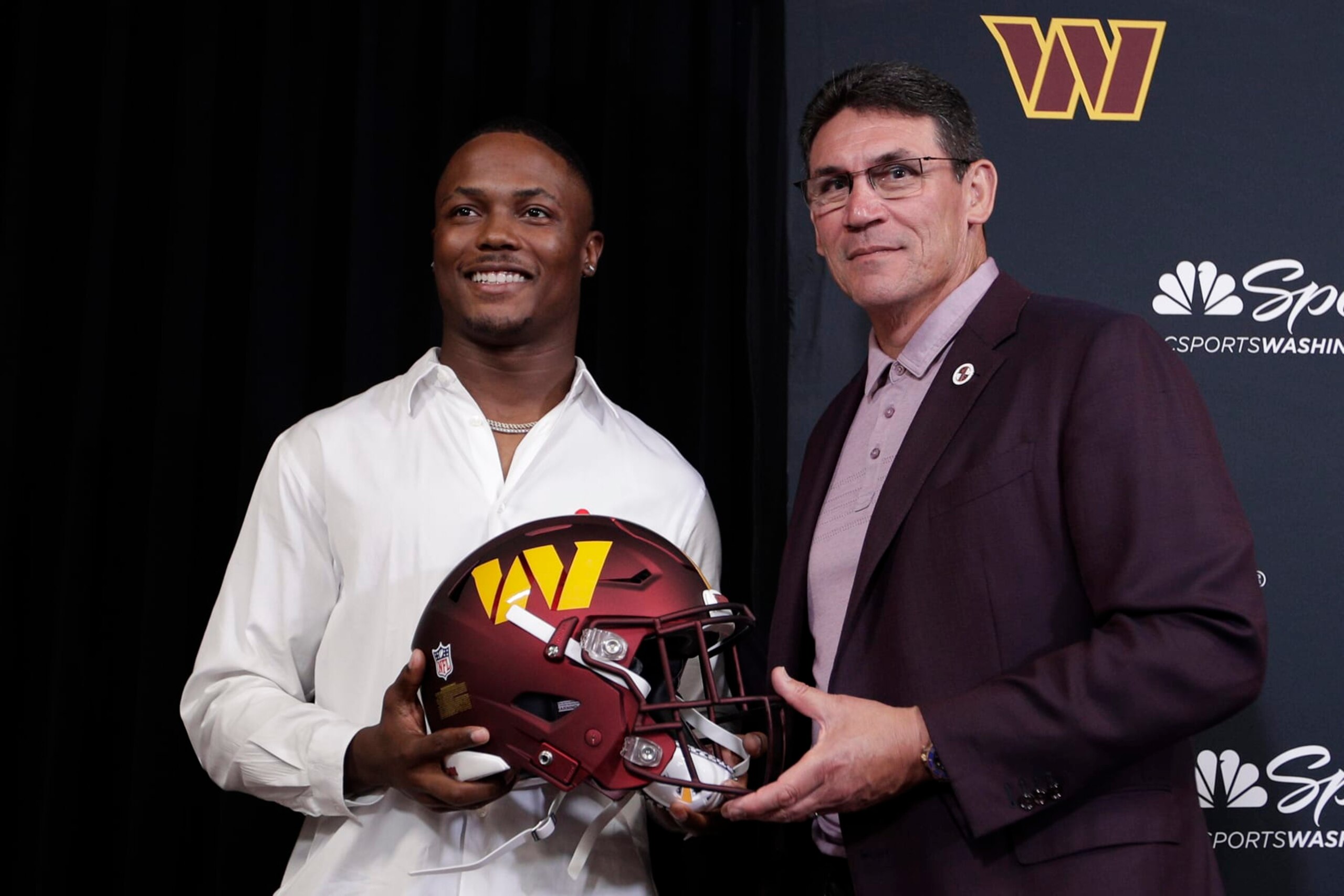 Washington Commanders NFL football team new wide receiver Terry McLaurin, left, poses with head coach Ron Rivera after a press conference at Inova Sports Performance Center in Ashburn, Va., Wednesday, July 6, 2022. (AP Photo/Luis M. Alvarez)